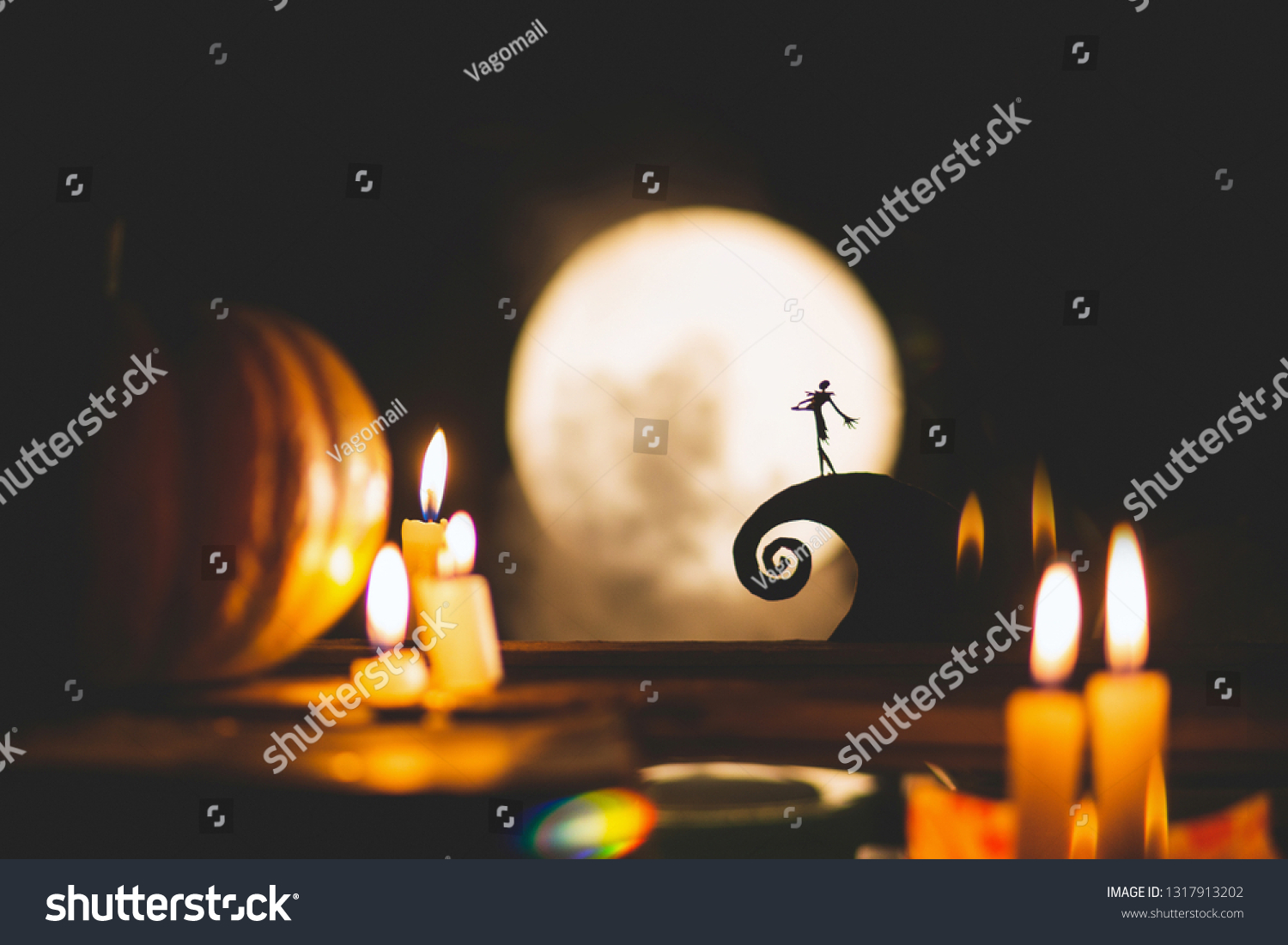Silhouette of a man or a poet on the background of the moon and pumpkins. Feast of the day of the dead or Halloween. Small world and ciliate #1317913202