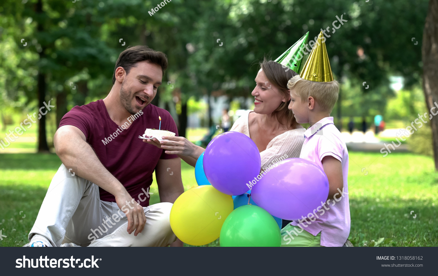 Mother and son congratulate dad on birthday, pleasant surprise from close people #1318058162