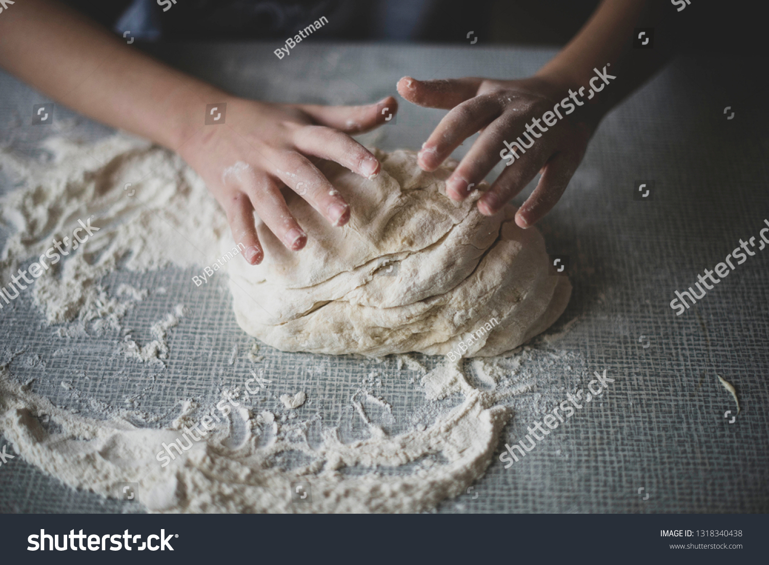 cooking a dough. hands in flour. food on the table #1318340438