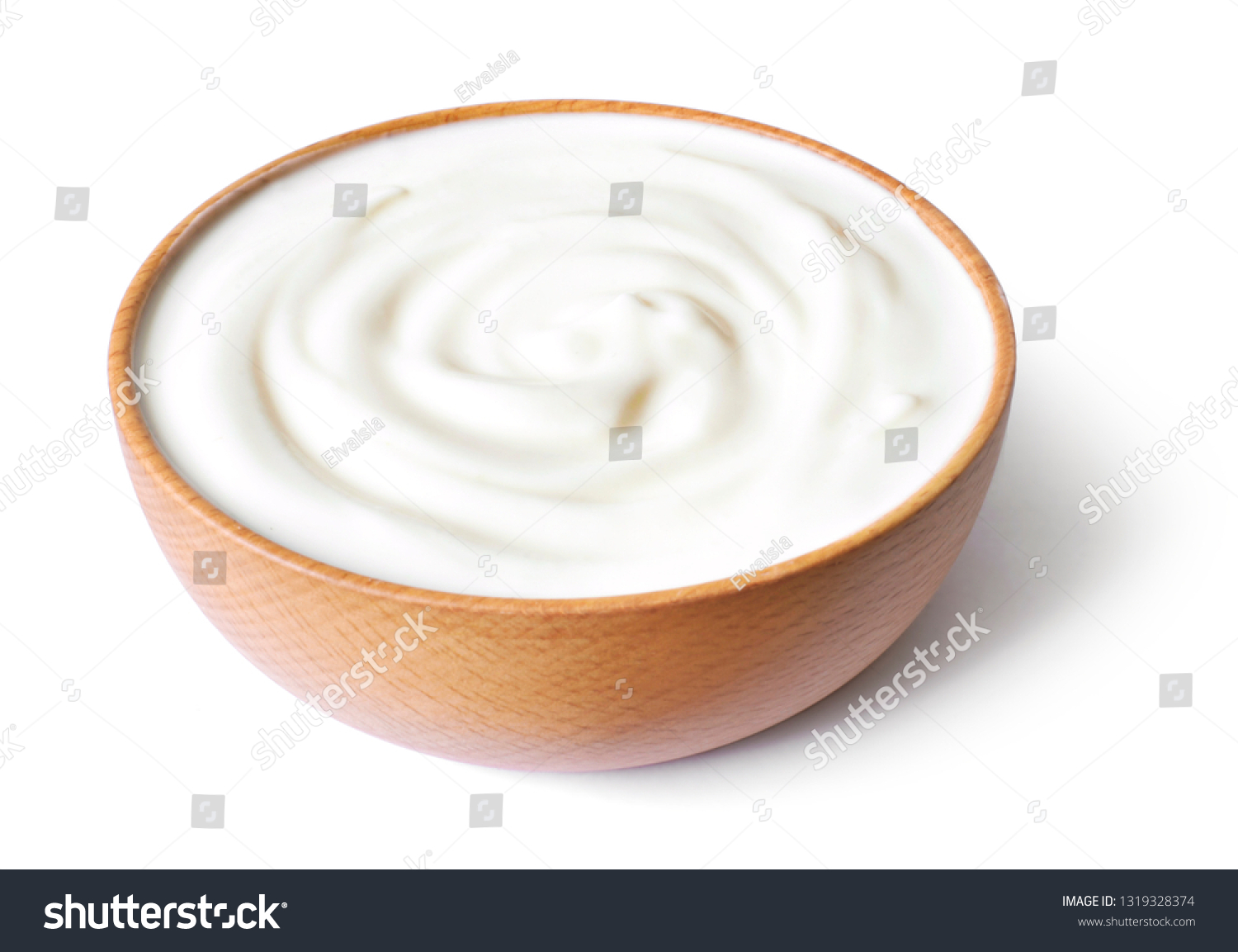 Delicious yogurt scene with wooden bowl, isolated on white background. Closeup shot of healthy fresh yogurt or cream. Top view. #1319328374