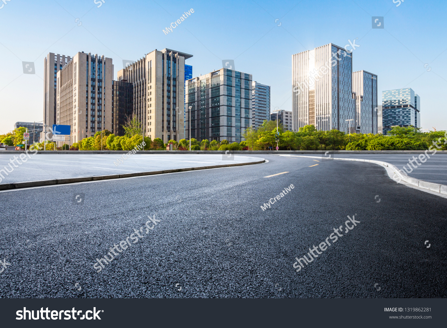 Panoramic skyline and modern business office buildings with empty road,empty concrete square floor #1319862281