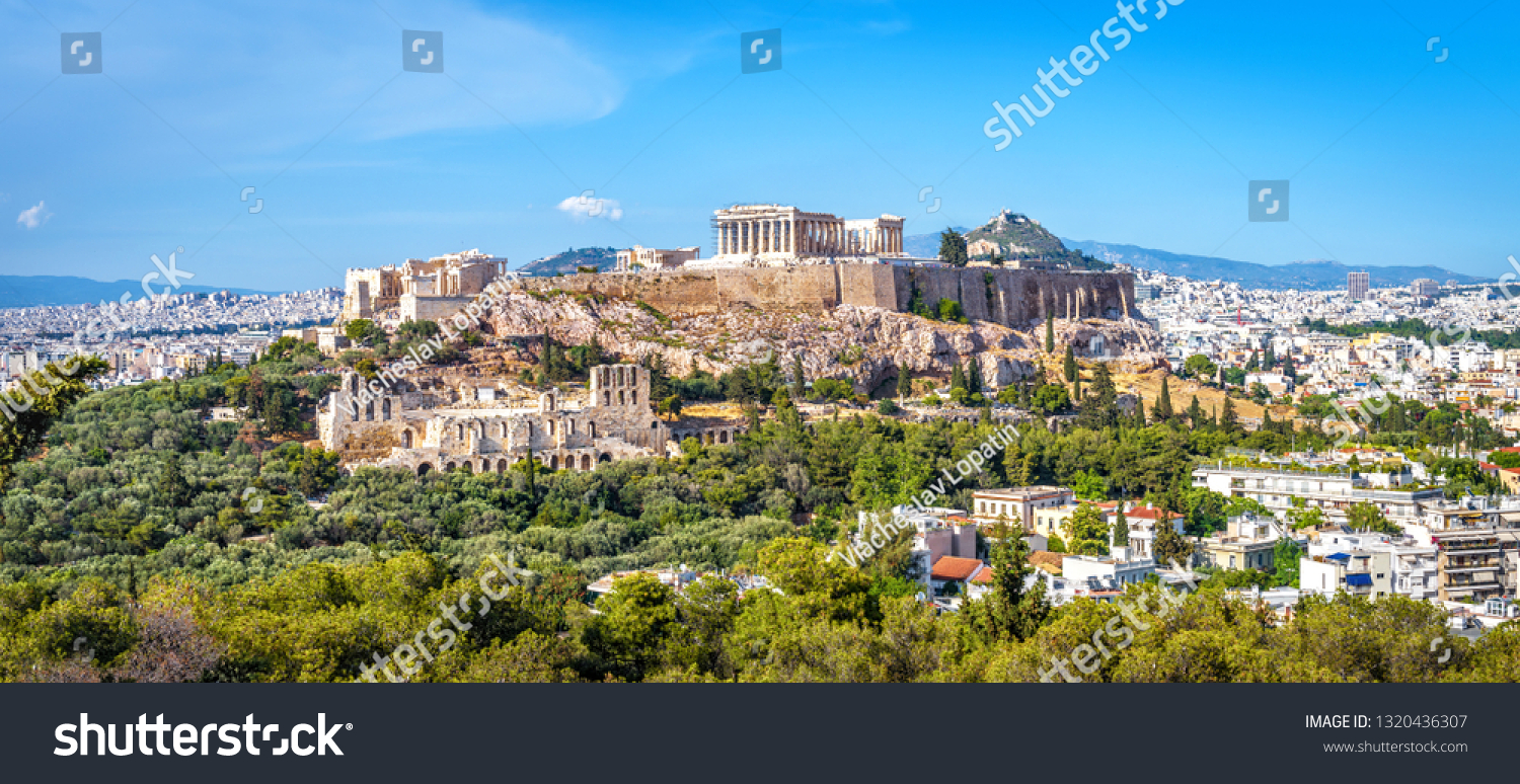 Panorama of Athens and Acropolis hill, Greece. Old Acropolis is famous landmark of Athens. Ancient Greek ruins in Athens center, panoramic view of remains of antique Athens city. World Heritage site. #1320436307
