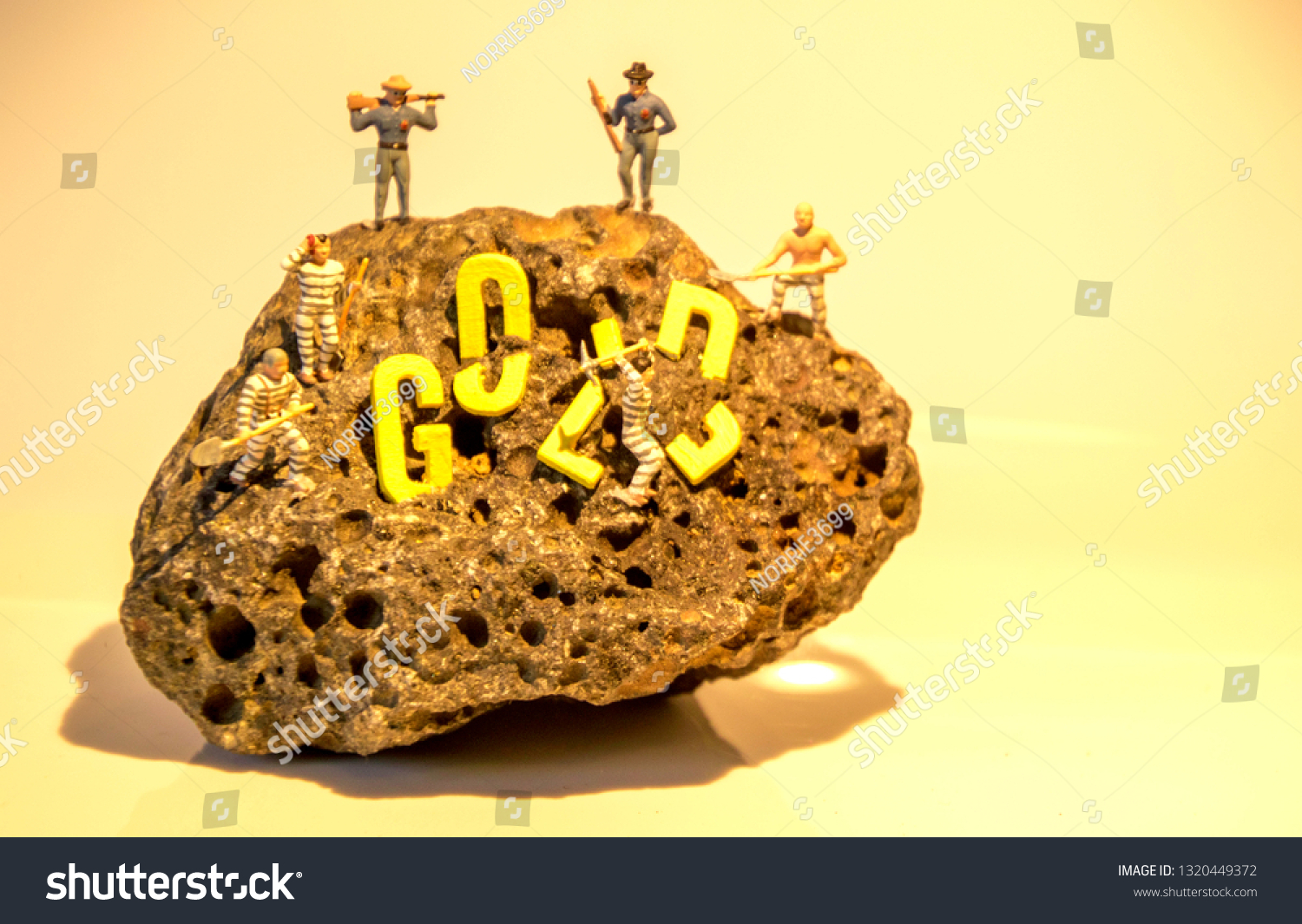 The word Gold on a rock surface to show the findings of any item really whether it be historic, treasure or for fun. #1320449372