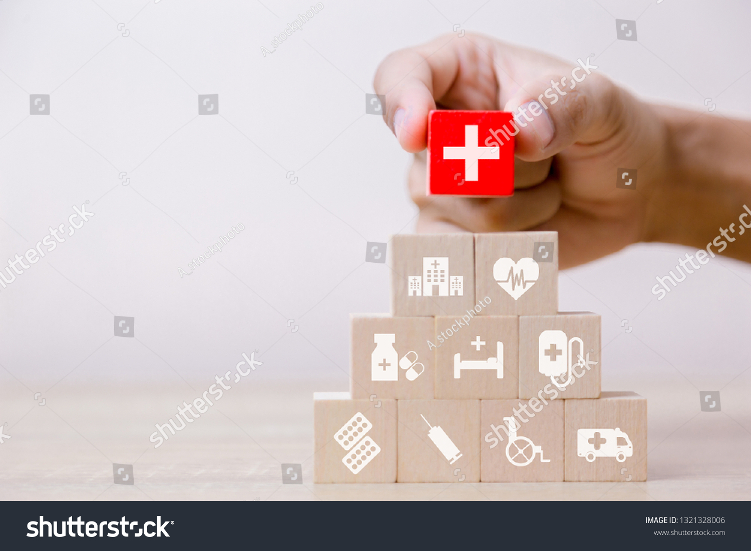 Health Insurance Concept,hand arranging wood block stacking with icon healthcare medical,for health. #1321328006
