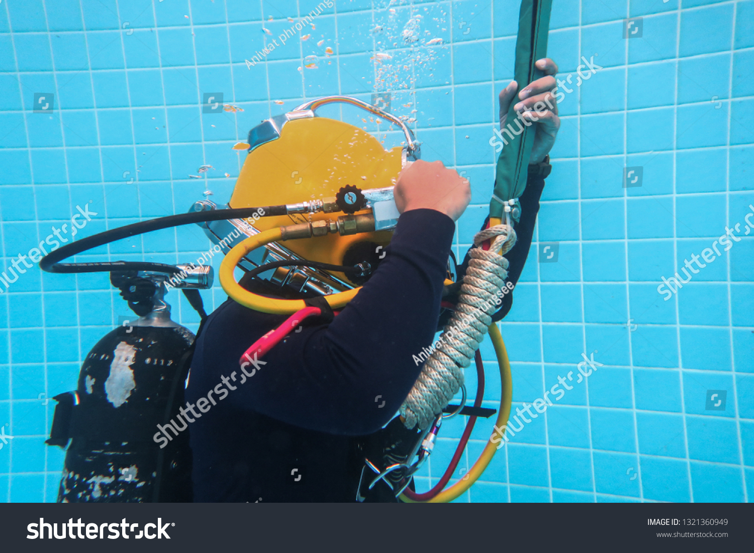 surface supplied commercial diver.
diver.
Underwater. #1321360949