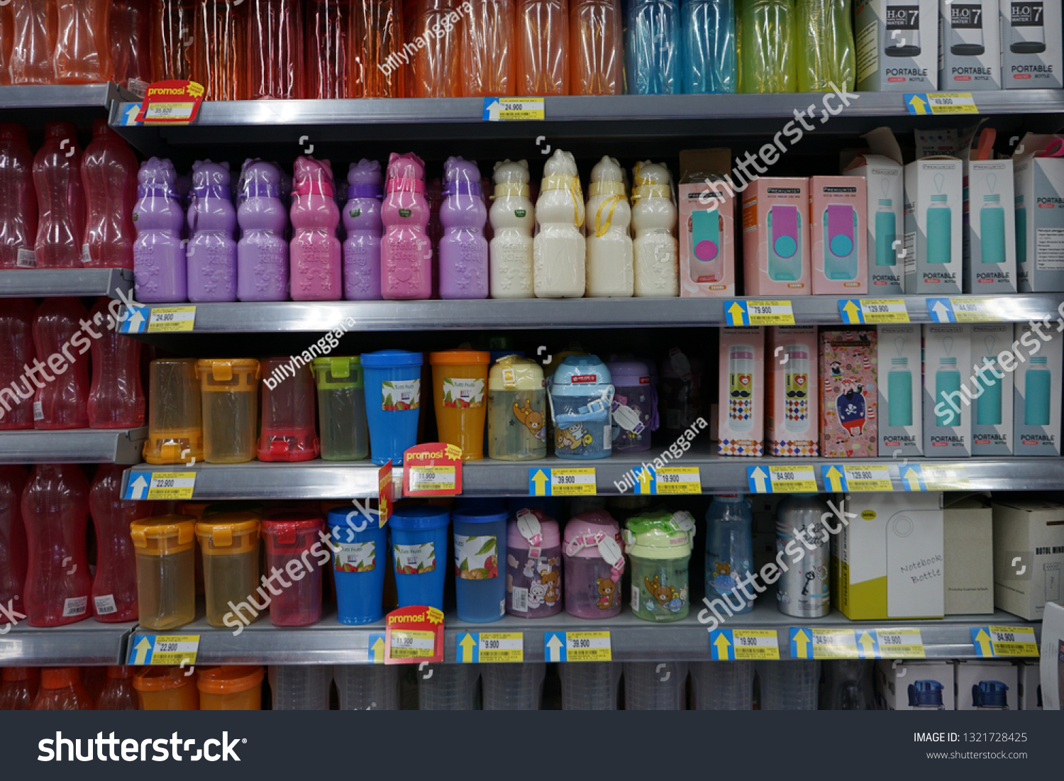 Yogyakarta, Indonesia - February 24, 2019: Various brands of cooking oils on the rack of supermarket #1321728425