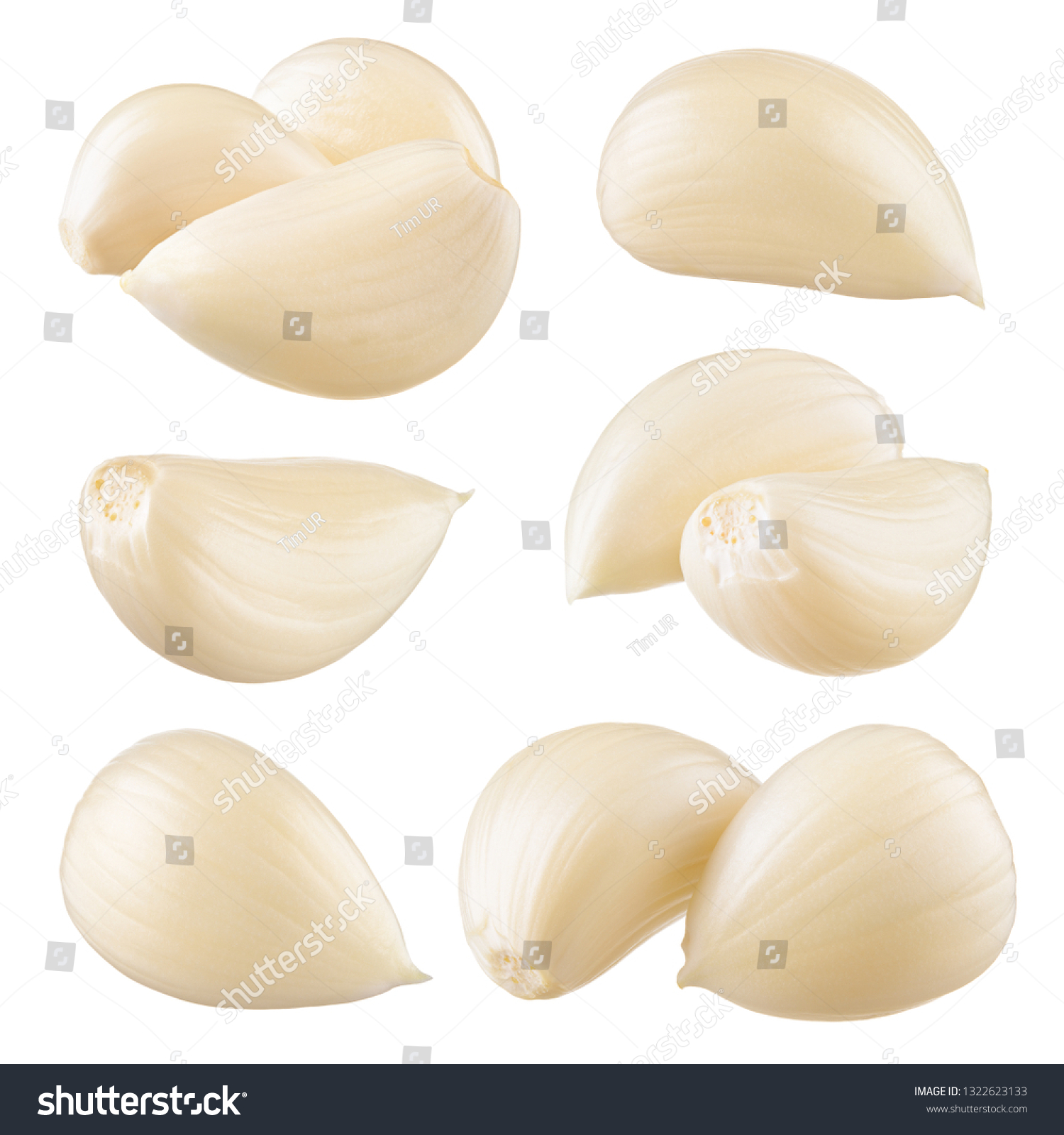 Garlic cloves. Garlic isolated. Garlic cloves on white. Collection. #1322623133