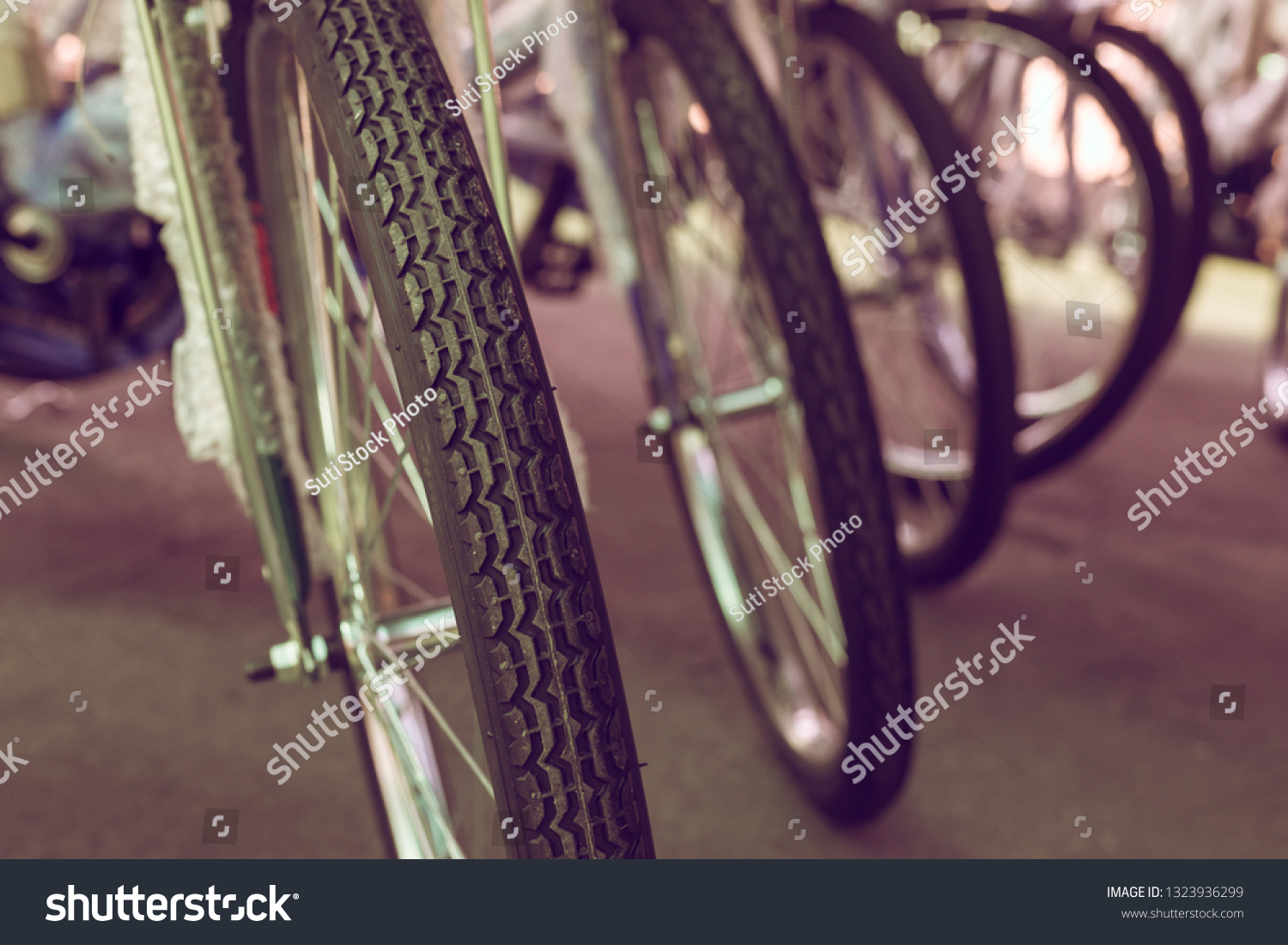 group of bicycle parked on street #1323936299
