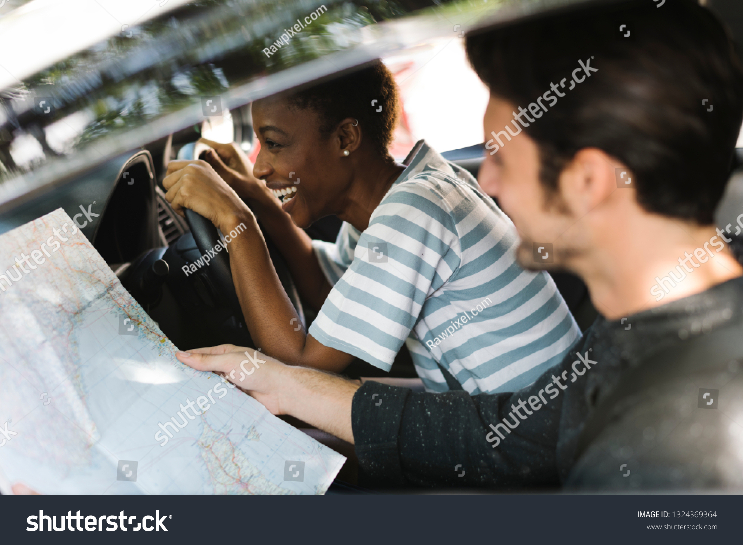 Using a map in a car for a direction #1324369364