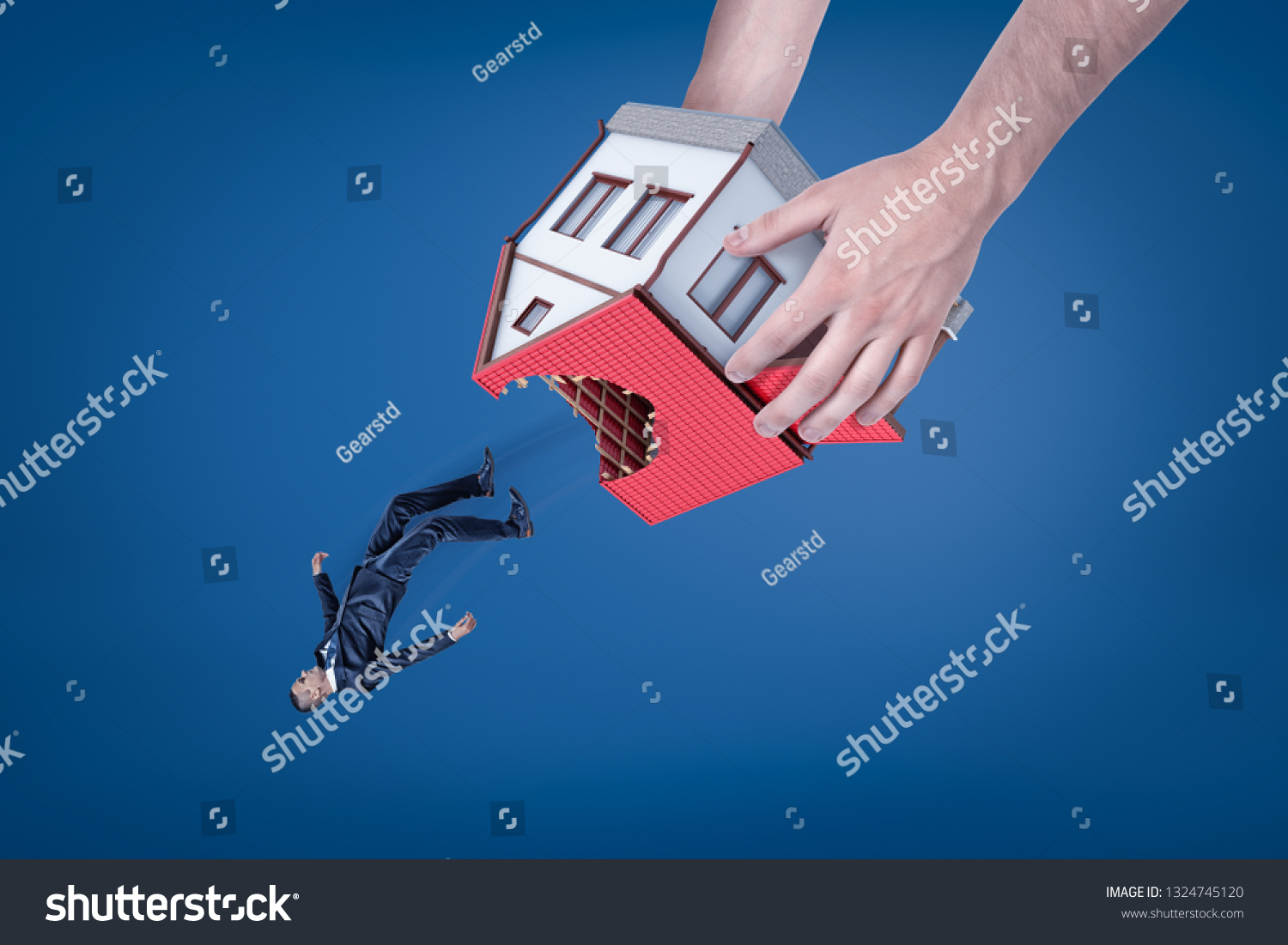 Close-up of man's hands holding house with hole in roof upside down and dropping out little businessman. Real estate scam. Eviction of tenant. Housing issues. #1324745120