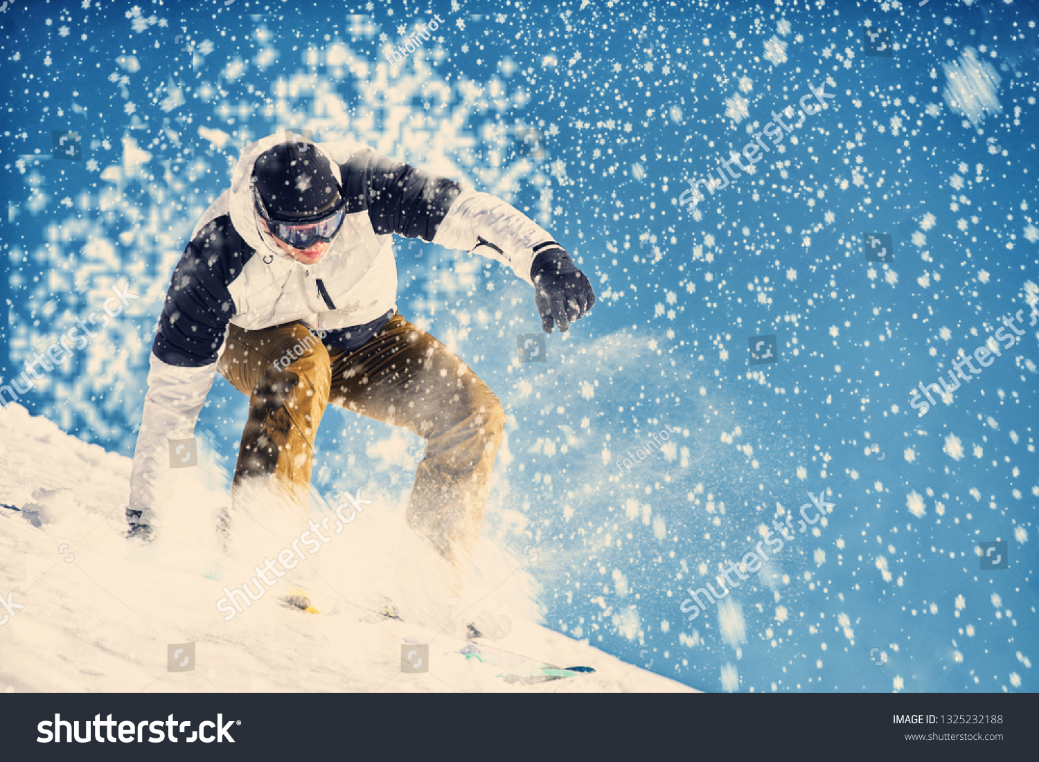Young man snowboarder running down the slope in Alpine mountains. Winter sport and recreation, leisure outdoor activities. #1325232188
