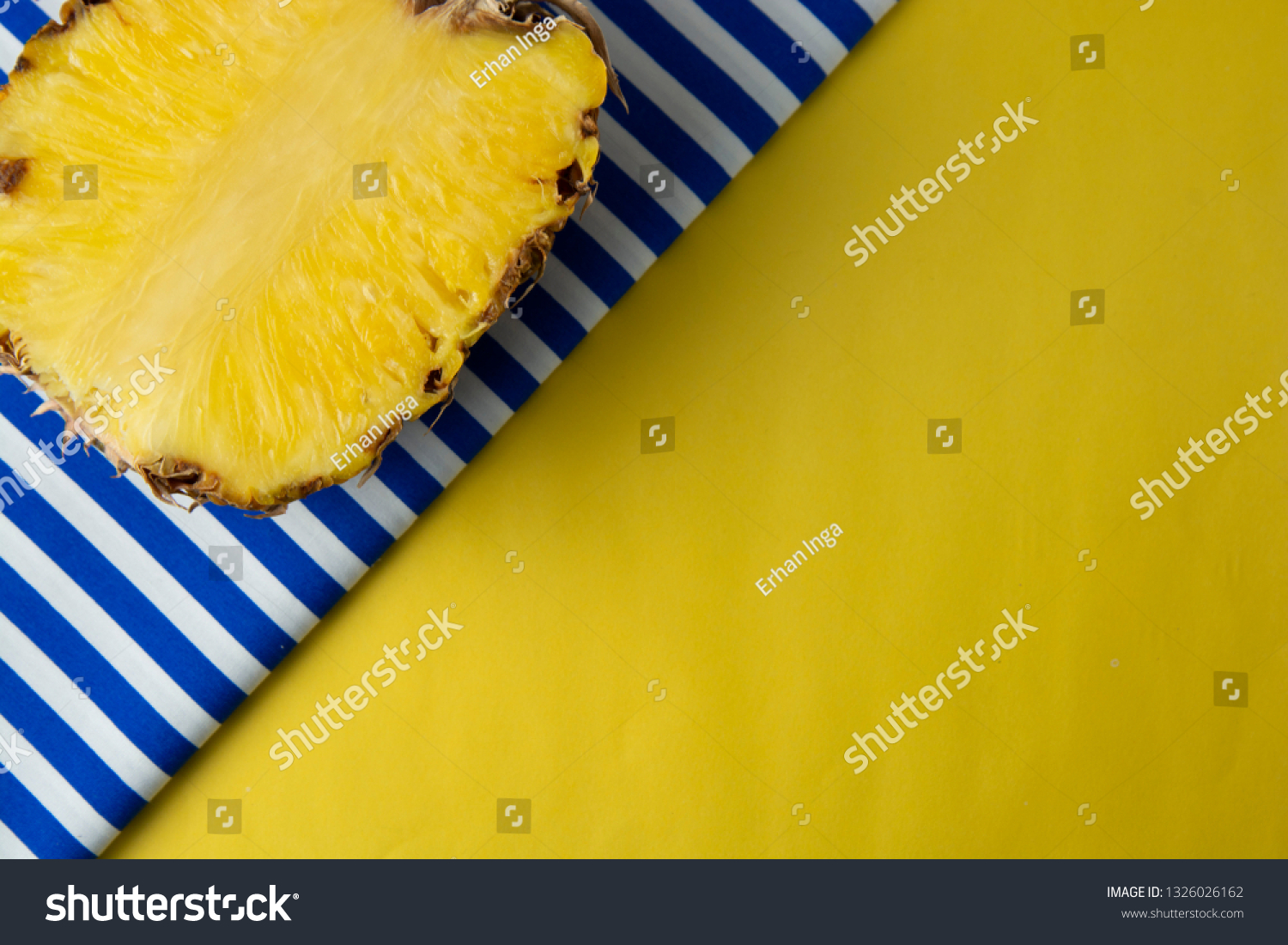 Pineapple on yellow light background. Abstract summer background, copy space. #1326026162