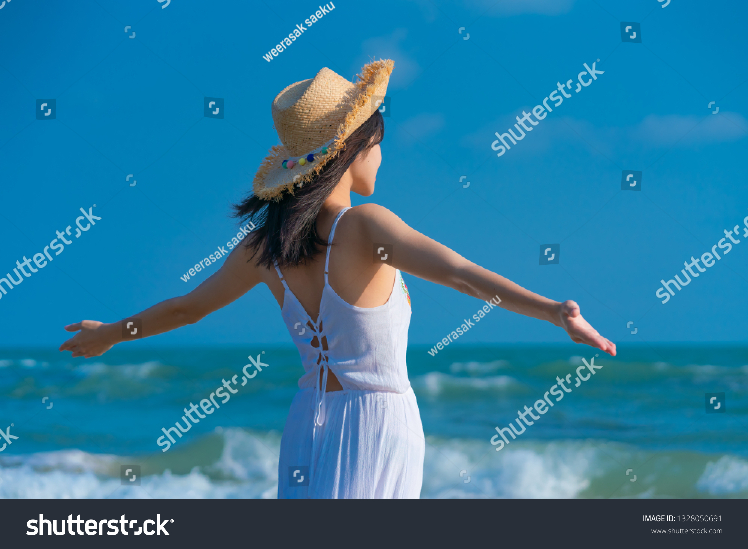 Woman relaxing on the beach. Woman relaxing on the beach. .Vacation lifestyle. #1328050691
