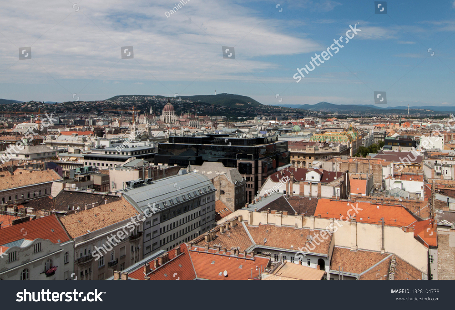 The Hungarian Parliament Building, rooftop view from the tower of St. Stephen's Basilica. Skyline of Budapest, Hungary, Europe. Buildings, towers and colorful rooftops. European capital city skyline. #1328104778