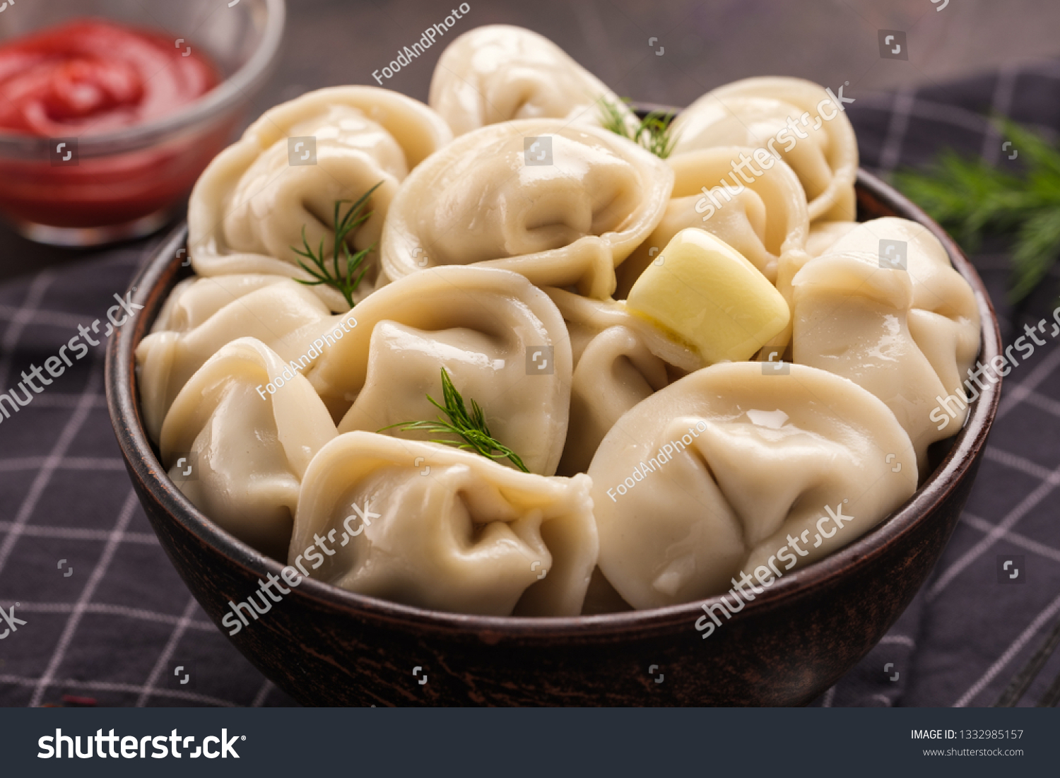 Homemade meat dumplings - russian pelmeni. Dumplings, filled with meat, ravioli. Dumplings with filling. Close-up. #1332985157