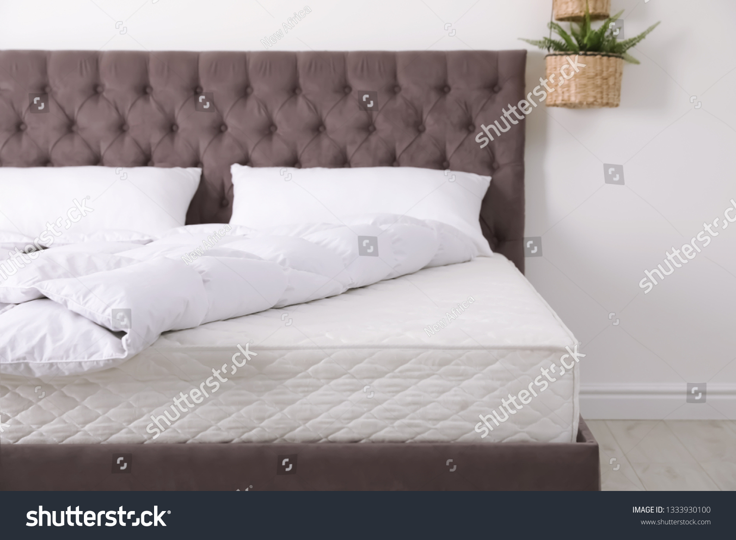 Comfortable bed with new mattress in room. Healthy sleep #1333930100