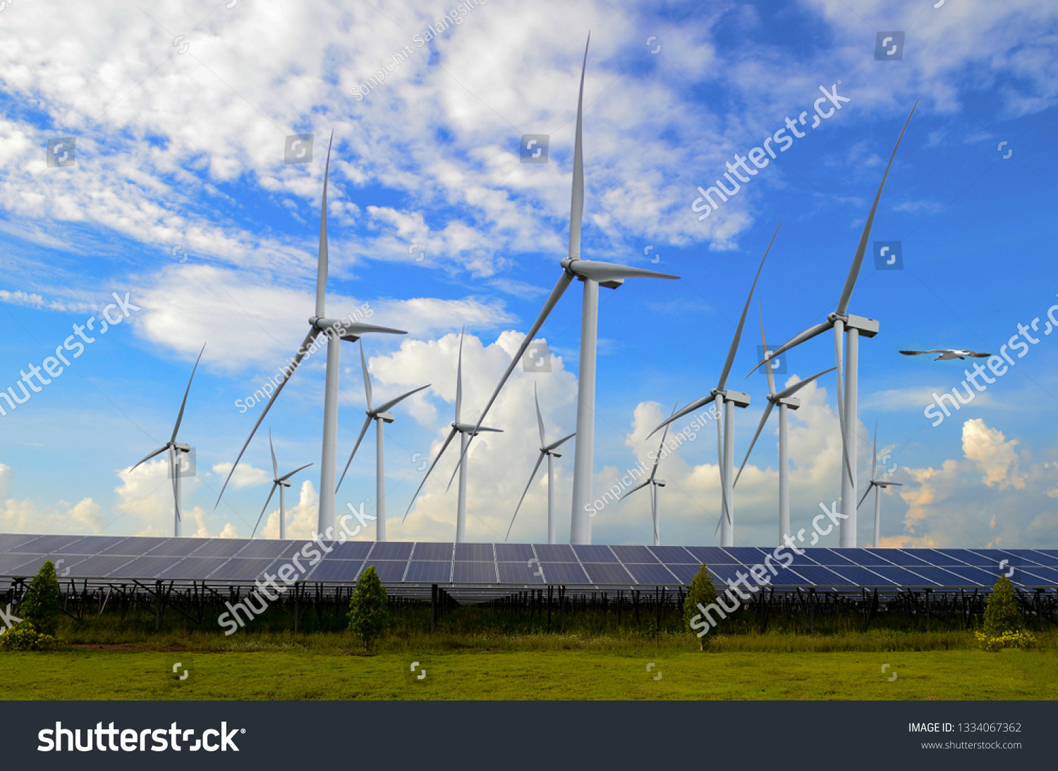 Wind turbines for electricity generationSolar Power Station ,electric pole,wind turbine  #1334067362