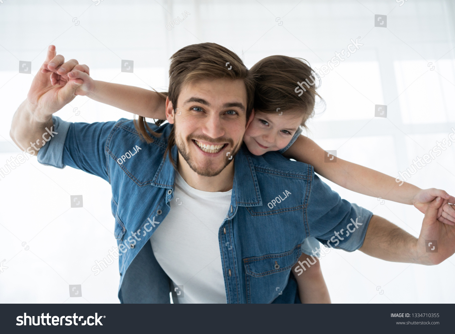 Happy loving family. Father and his daughter child girl playing together. Father's day concept. #1334710355
