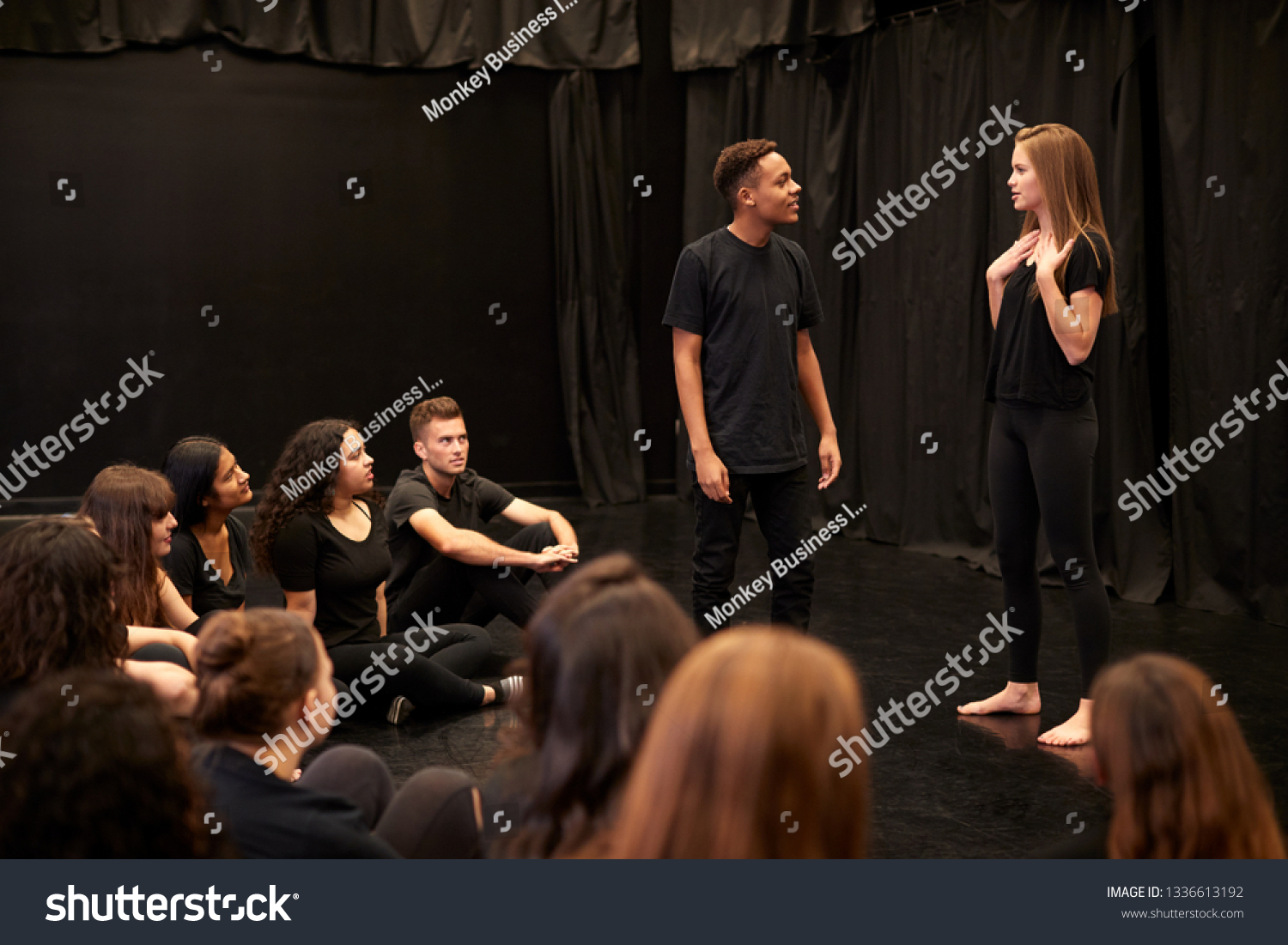 Male And Female Drama Students At Performing Arts School In Studio Improvisation Class #1336613192