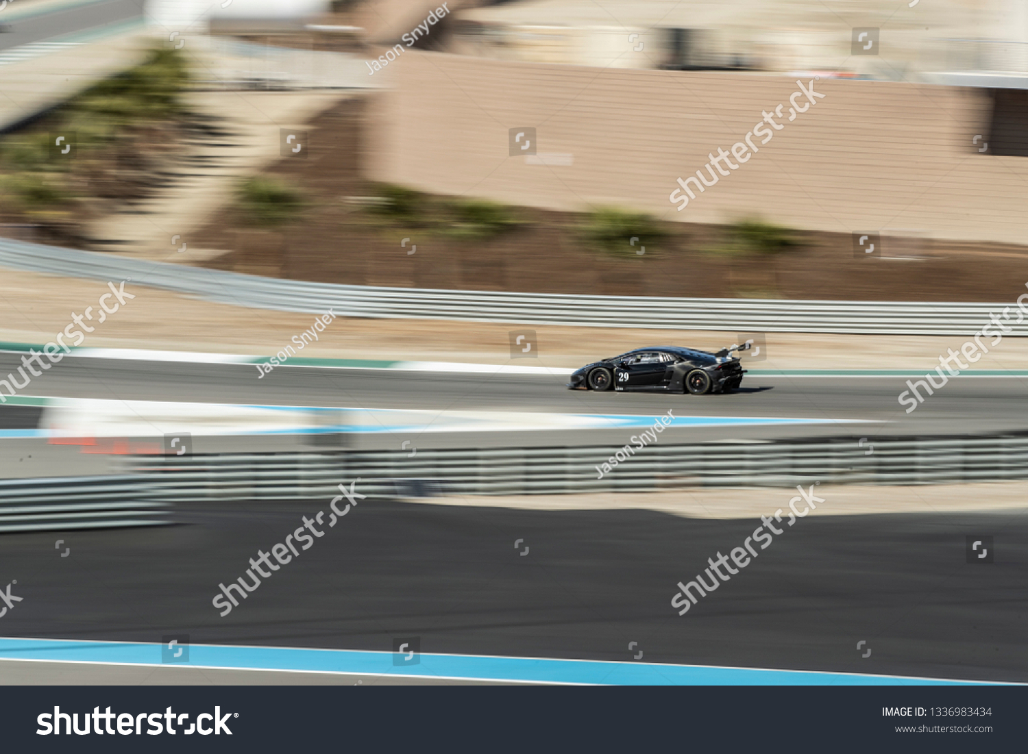 Race car on a race track. #1336983434