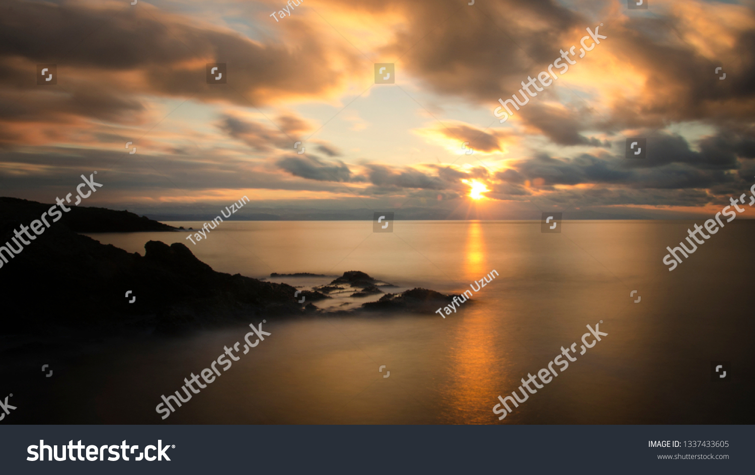 SUNSET, SEA, CLOUDS AND LONG SHUTTER #1337433605