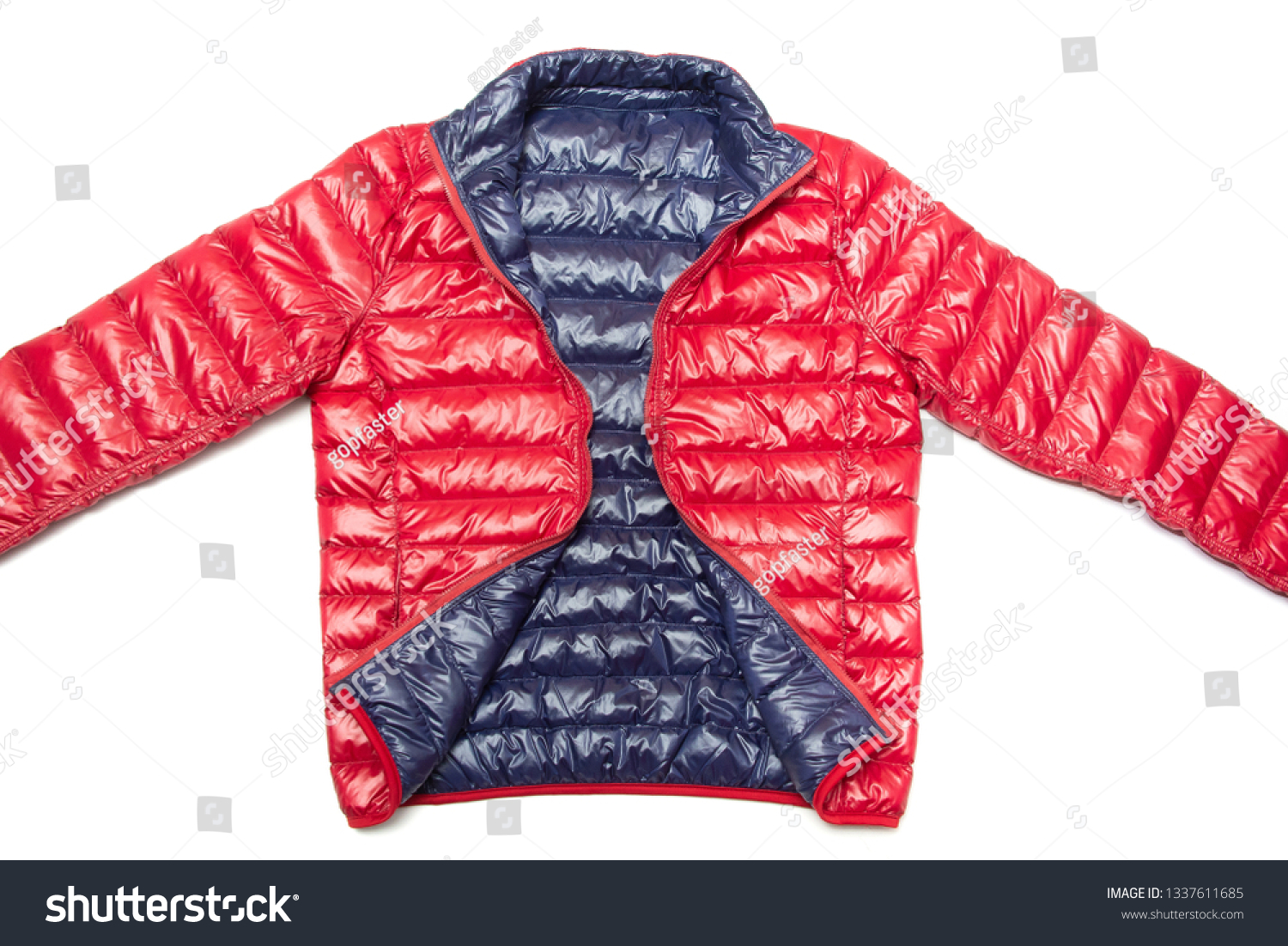 ฺBlue and red full zipper windbreaker down jacket, rain proof down jacket. Down jacket sport shiny nylon full zip isolated on white. #1337611685