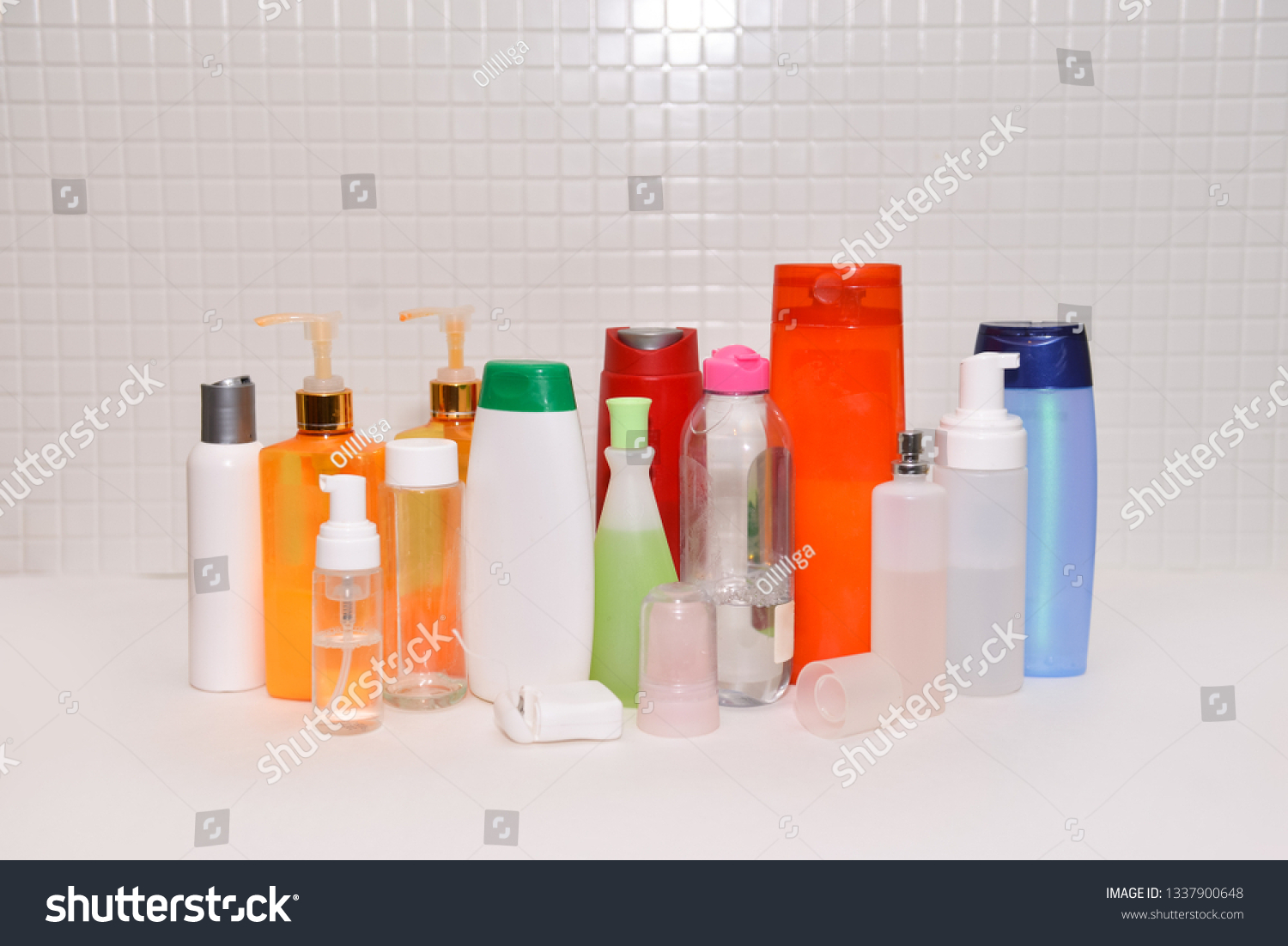Cosmetics, Moisturizer, Bottle. Different cosmetic bottles on background. set of cosmetic products. Cosmetic package collection for cream, soups, foams, shampoo #1337900648