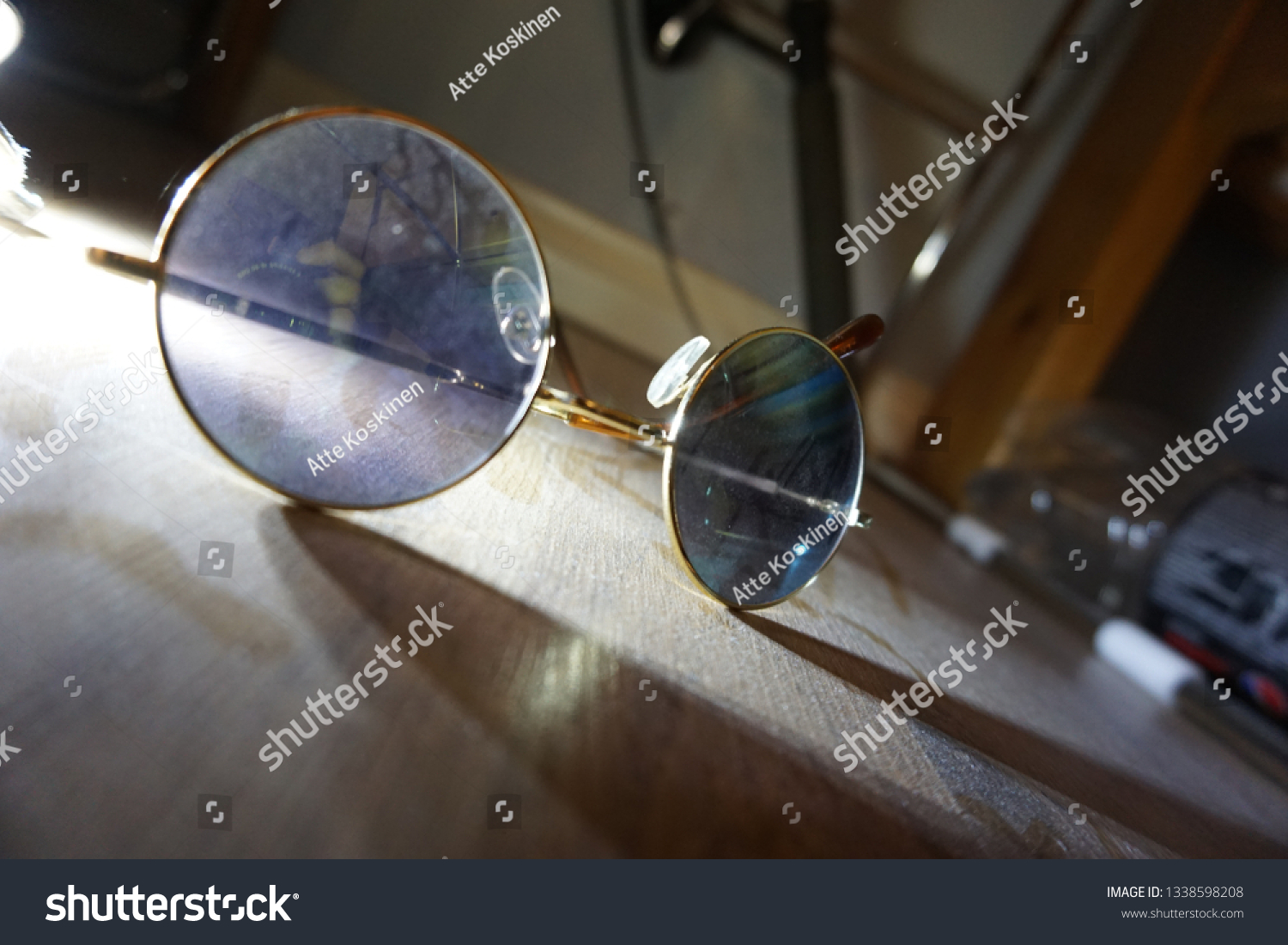 Sun glasses on dusty surroundings #1338598208