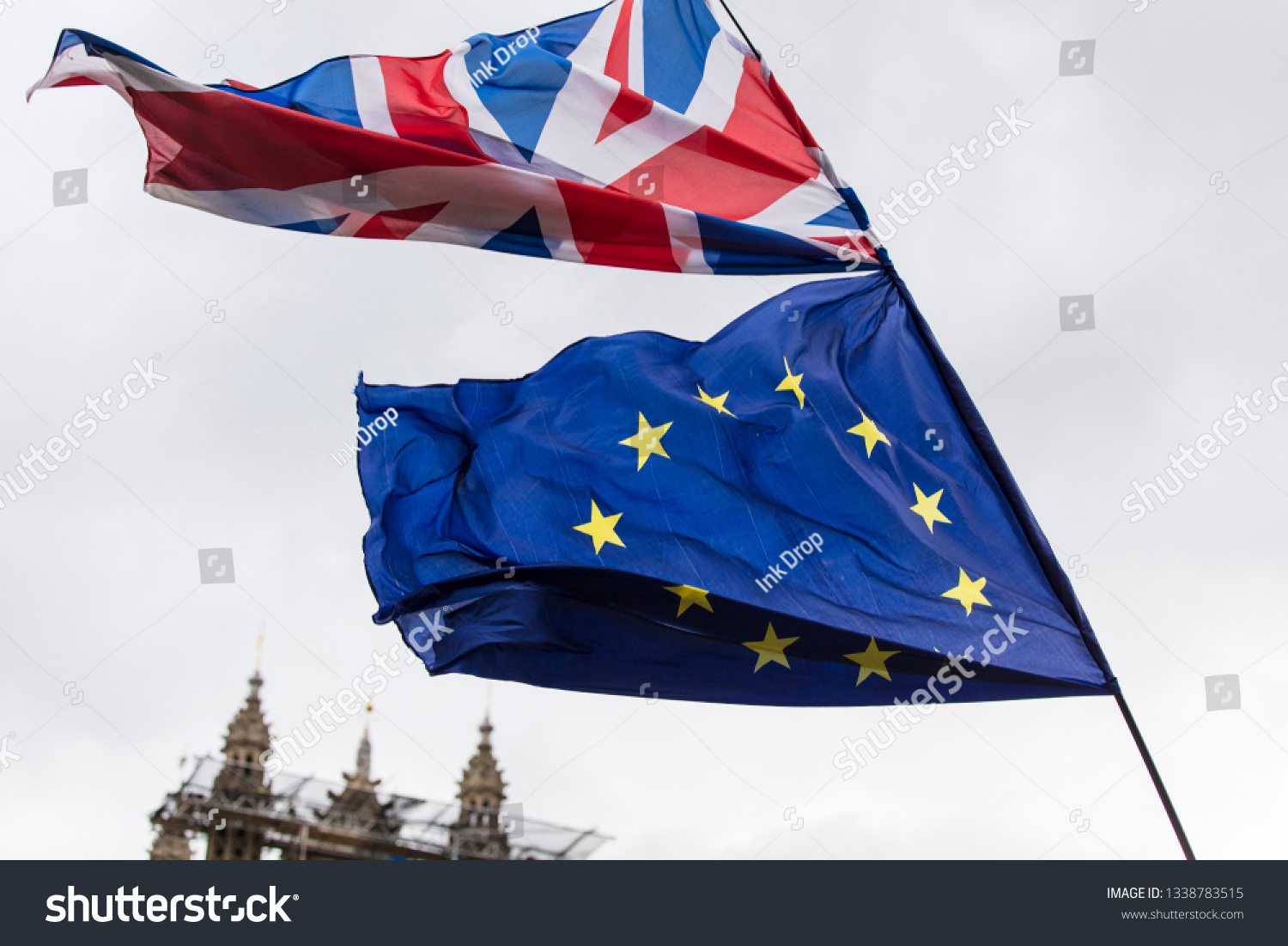 European Union and British Union Jack flag flying together.  #1338783515