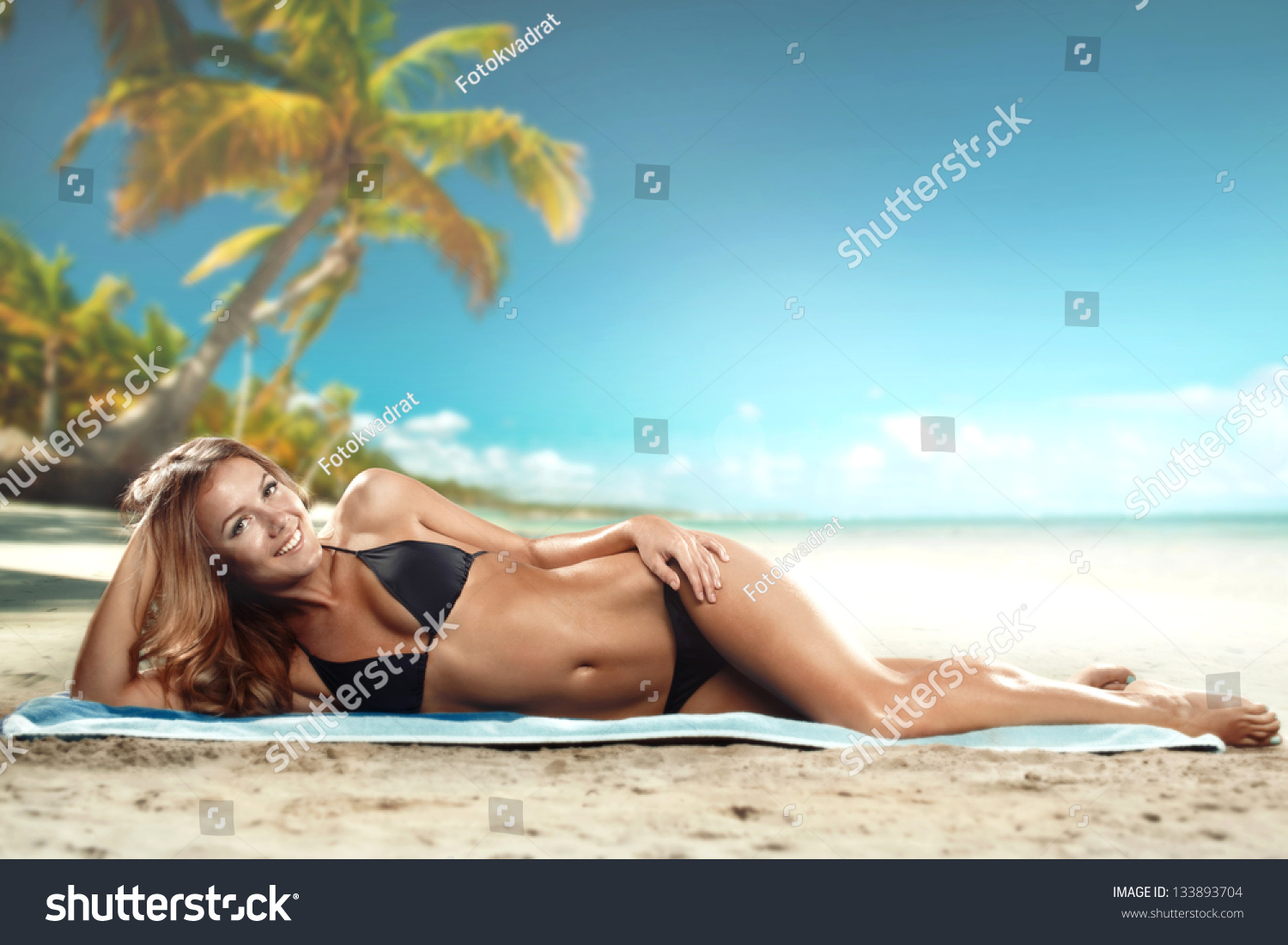girl lying on the beach #133893704