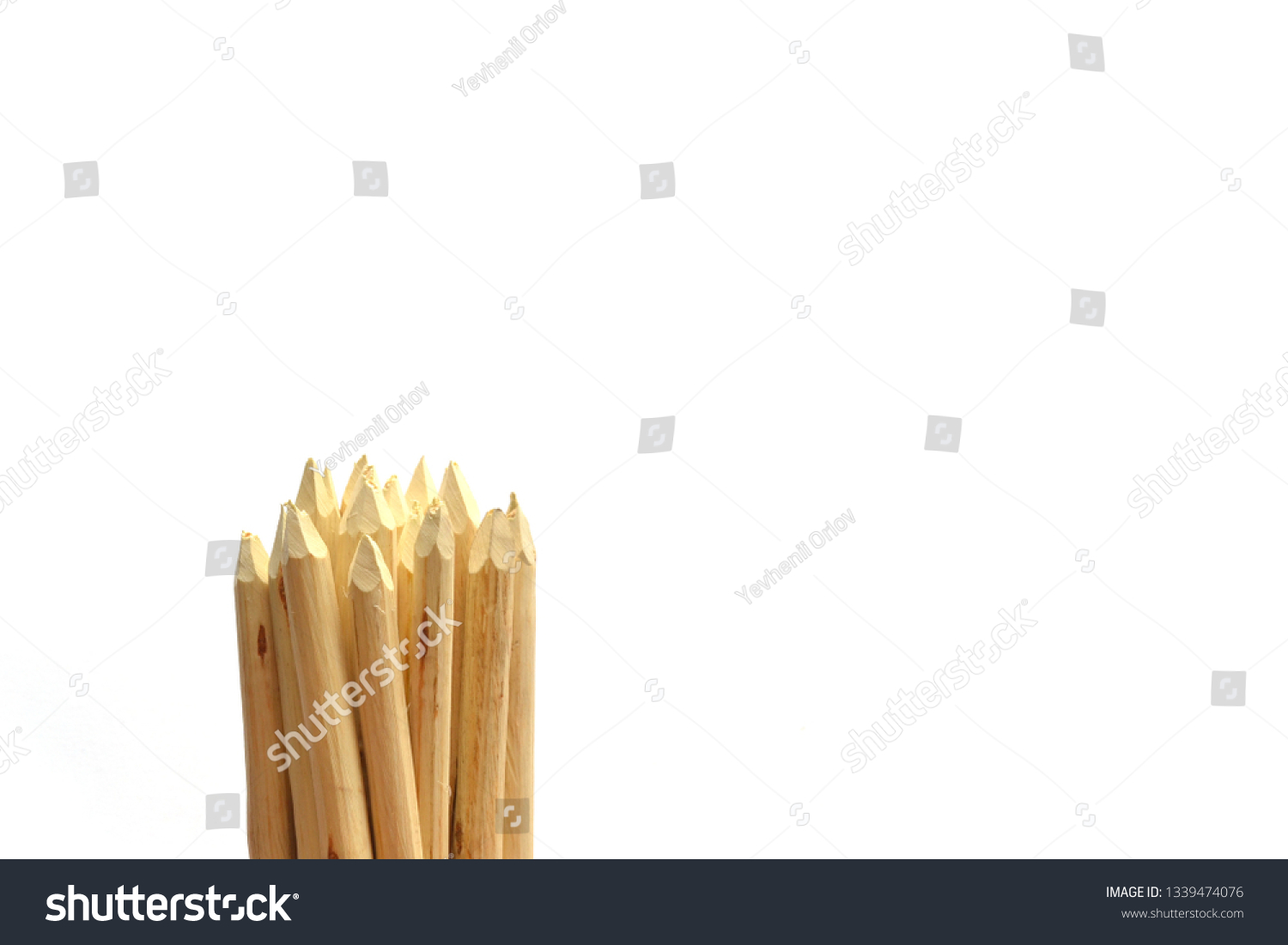 Wooden stakes on a white background. #1339474076