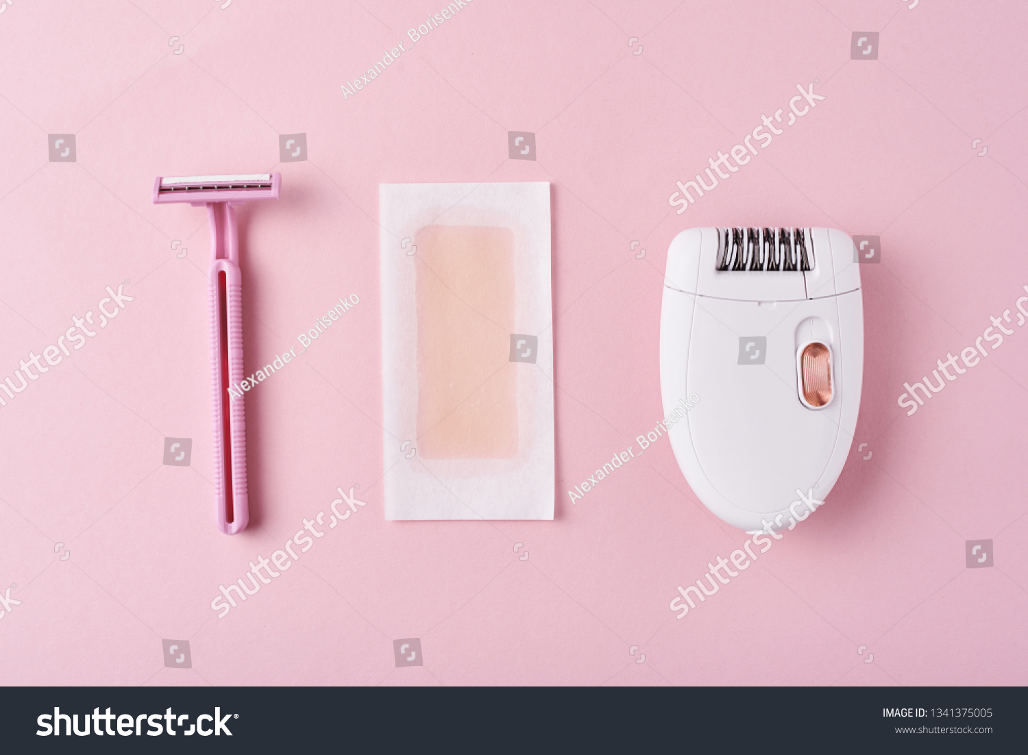 Epilator, razor for shaving and wax strips on pink background. Set for depilation, bodycare concept #1341375005