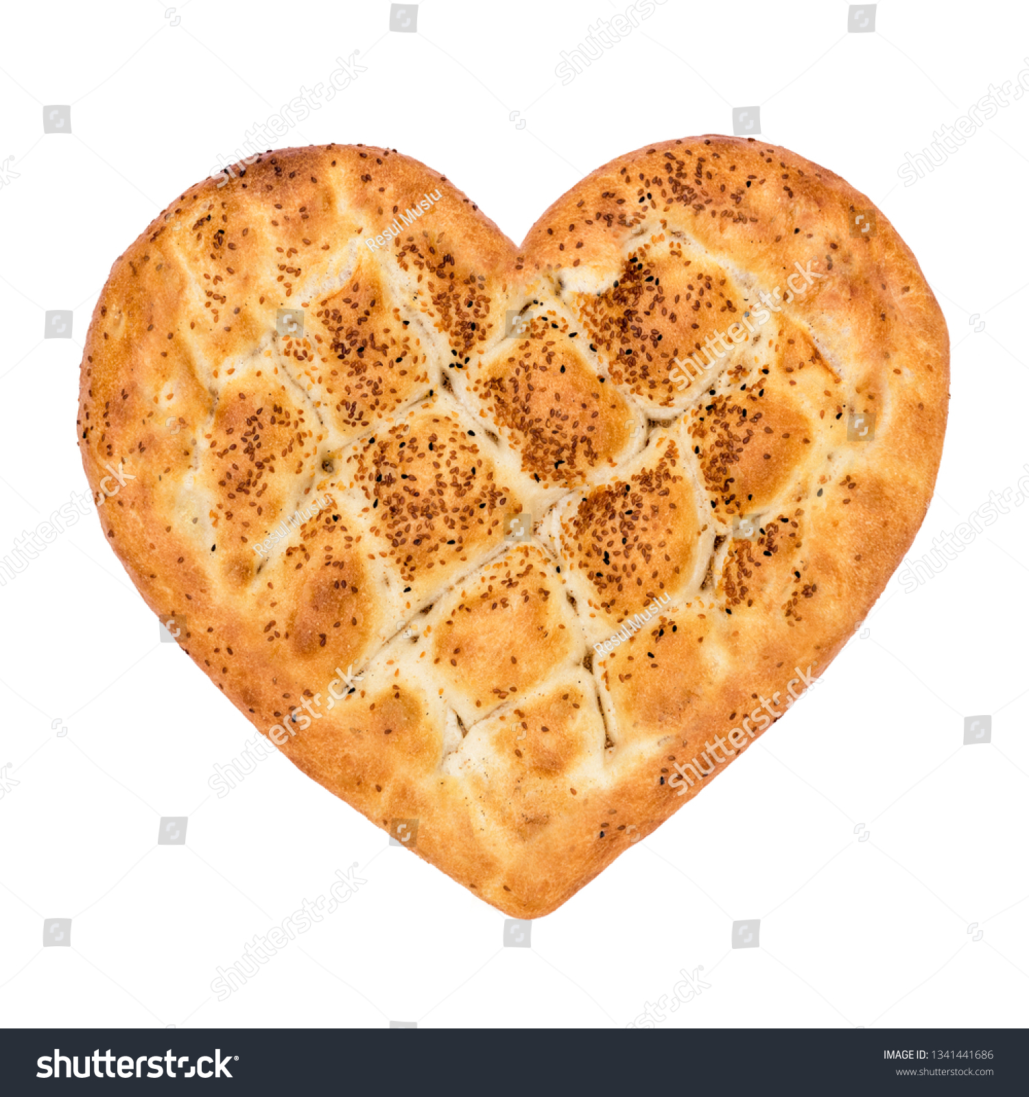 Ramadan Pita Heart Shaped (Ramazan Pidesi). Traditional Turkish bread for holy month Ramadan. Concept about love and relationship.  #1341441686