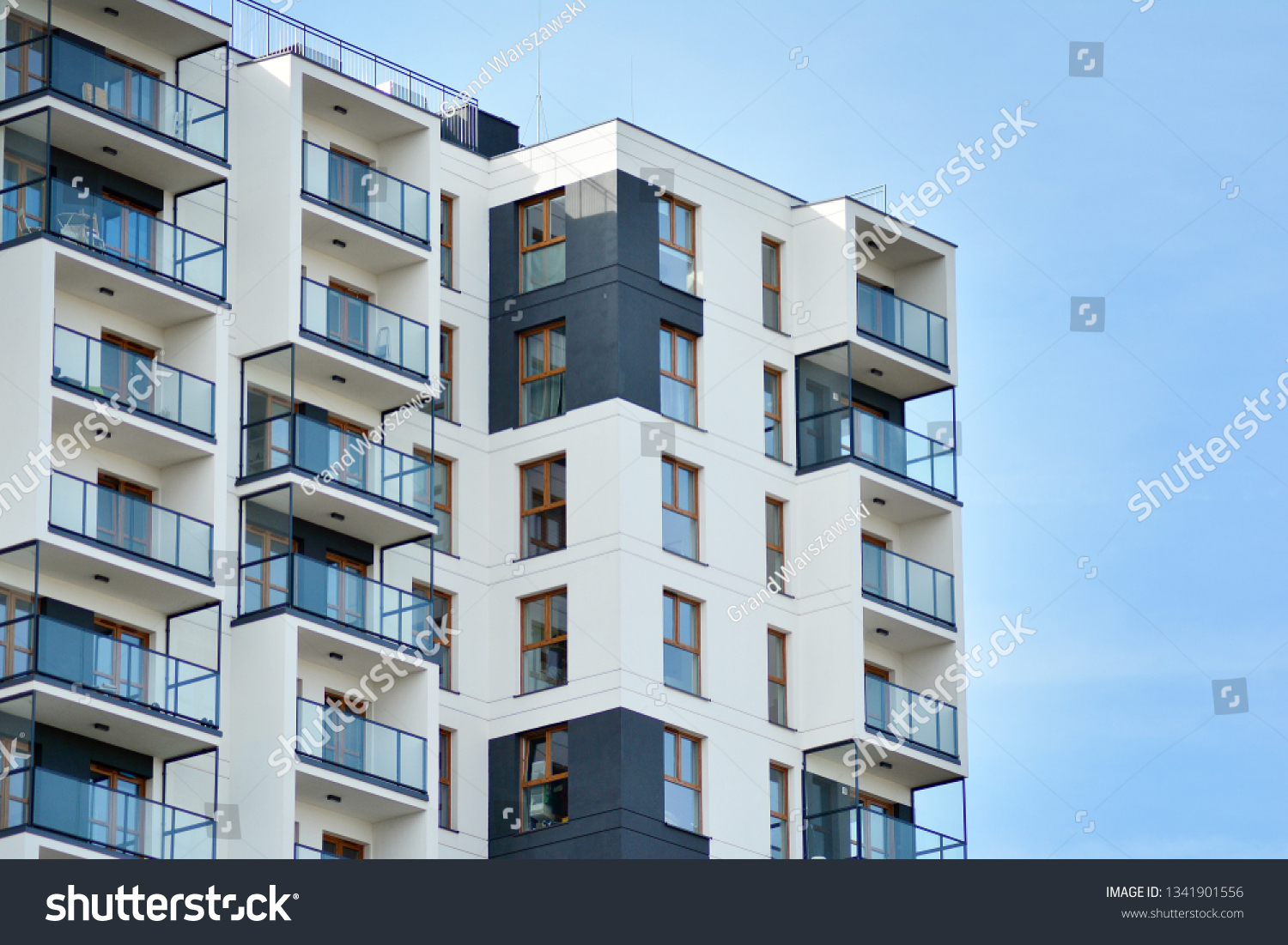 Multistory new modern apartment building. Stylish living block of flats. #1341901556