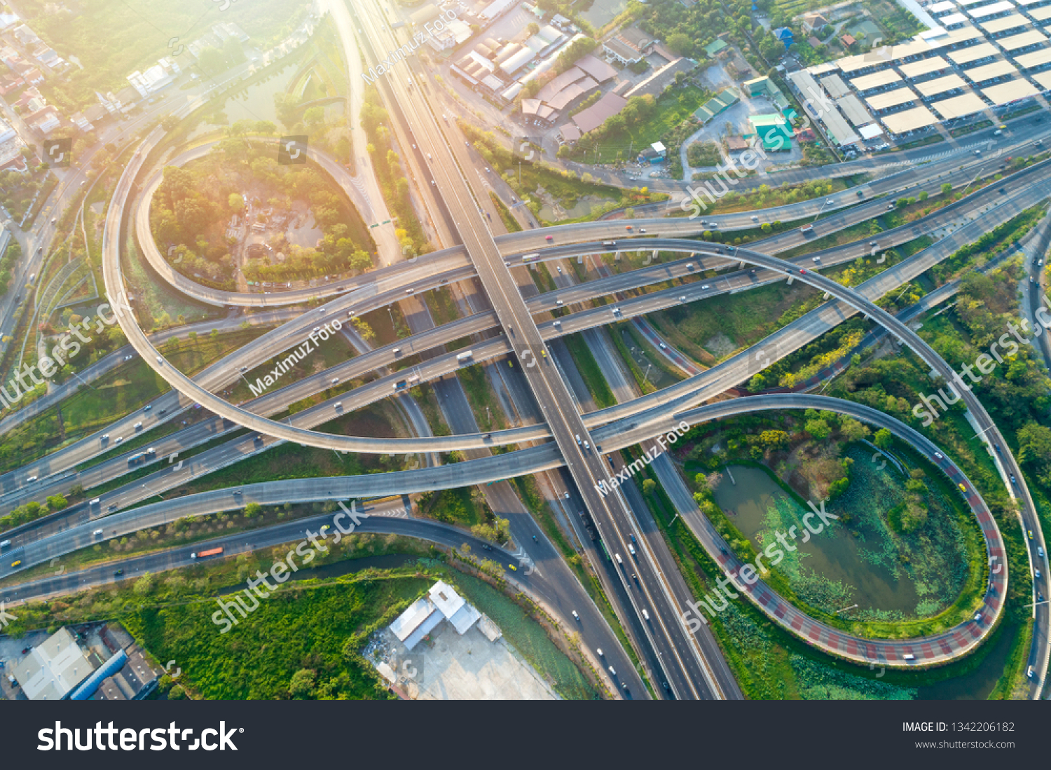 Bangkok Expressway top view, Top view over the highway,expressway and motorway at night, Aerial view interchange of a city, Shot from drone, Expressway is an important infrastructure in Thailand #1342206182