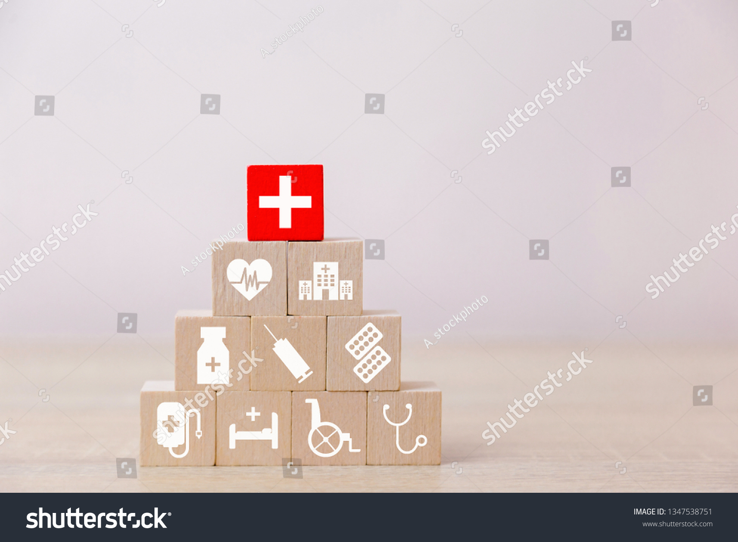 Health Insurance Concept,hand arranging wood block stacking with icon healthcare medical,for health. #1347538751