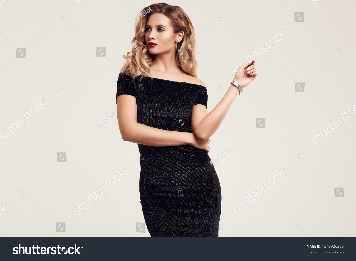 Portrait of gorgeous elegant sensual blonde woman wearing fashion black dress isolated on white background #1348926389
