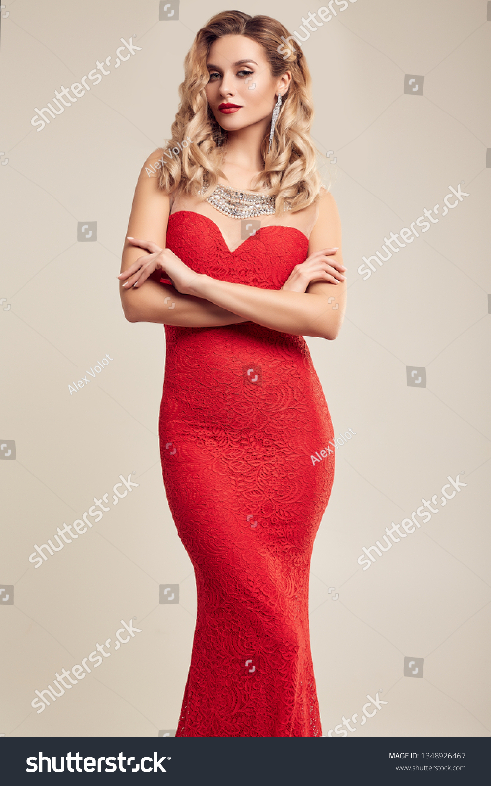 Portrait of gorgeous elegant sensual blonde woman wearing fashion red dress isolated on white background #1348926467