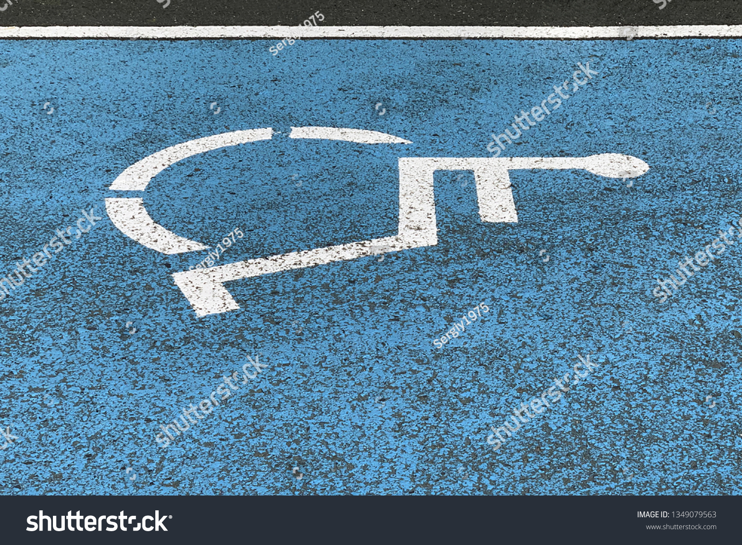 image of sign parking for the disabled on asphalt, close-up #1349079563
