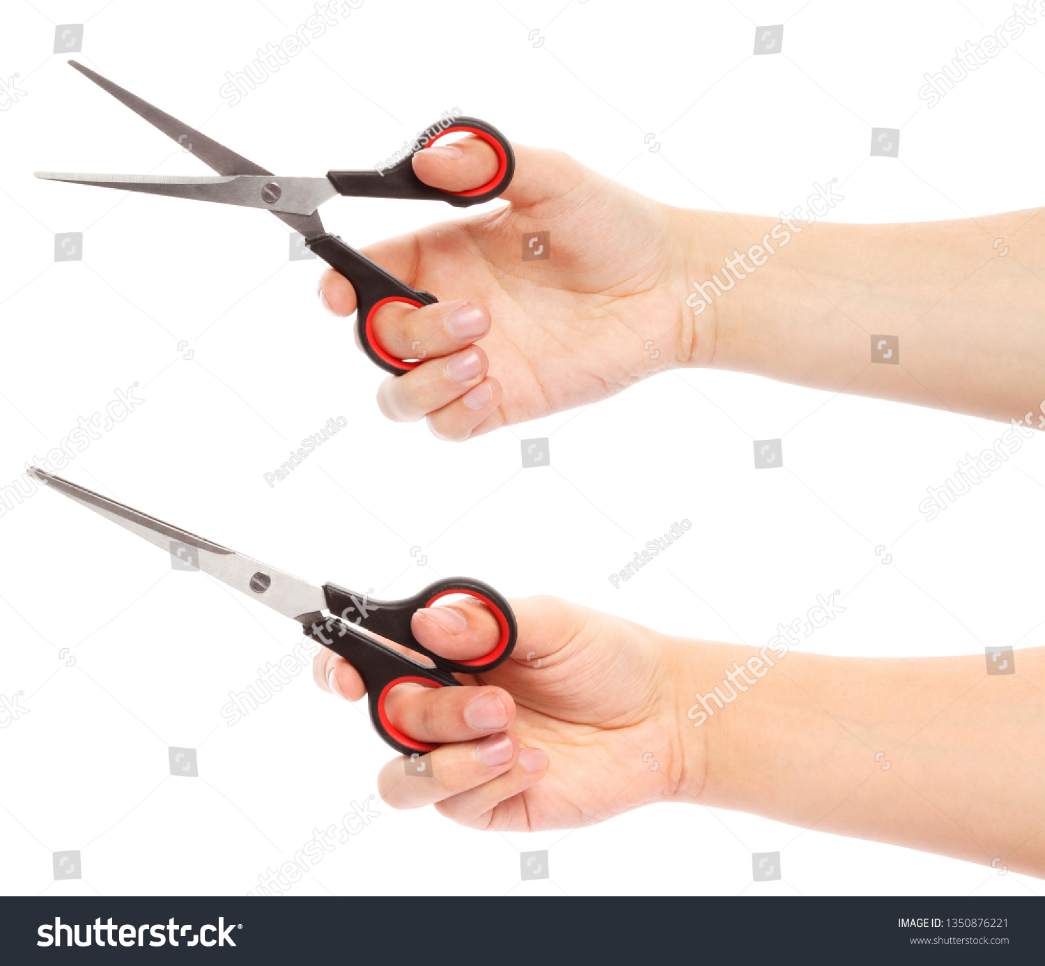 Hand holds scissors isolated on white background. Scissors in hand #1350876221