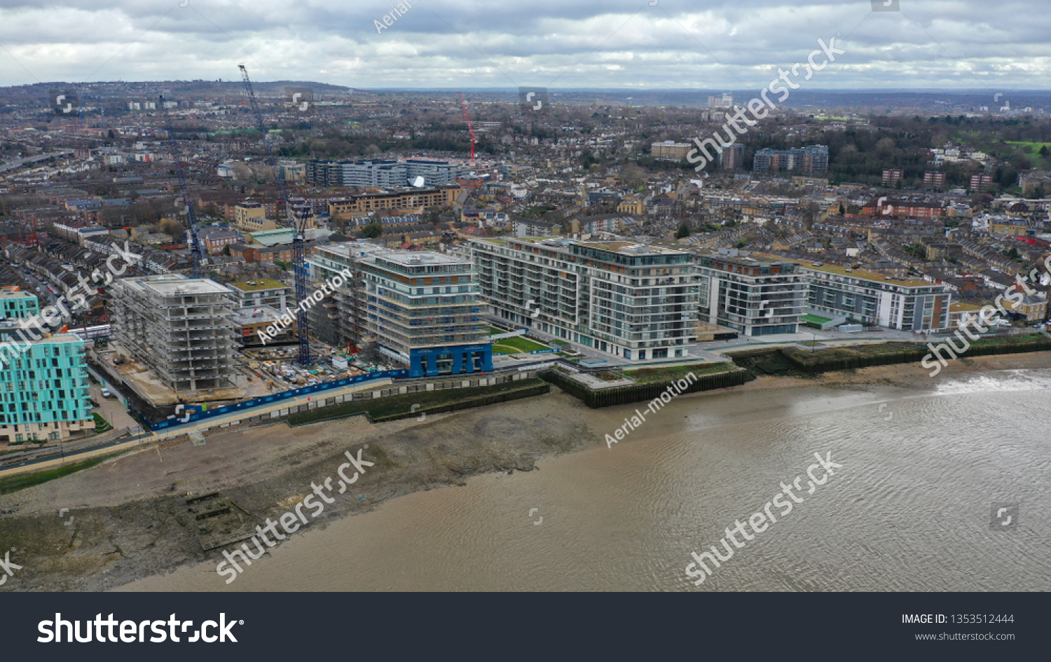 Aerial drone photo from residential area of Greenwich village next to river Thames, London, United Kingdom #1353512444
