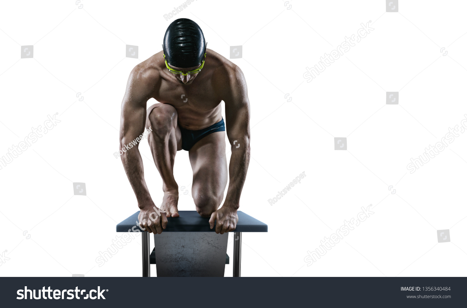 Swimming pool. Isolated muscular swimmer ready to jump.	 #1356340484