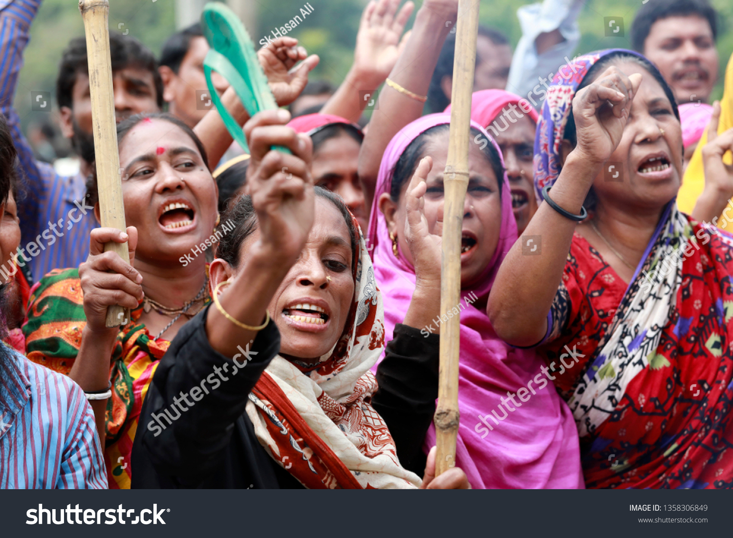 Dhaka, Bangladesh - April 03, 2019: Jute Mill workers in Damra blockade the staff quarter area on the Dhaka- Sylhet  highway as their 72-hour strike began 02 April 2019, Dhaka, Bangladesh.  #1358306849