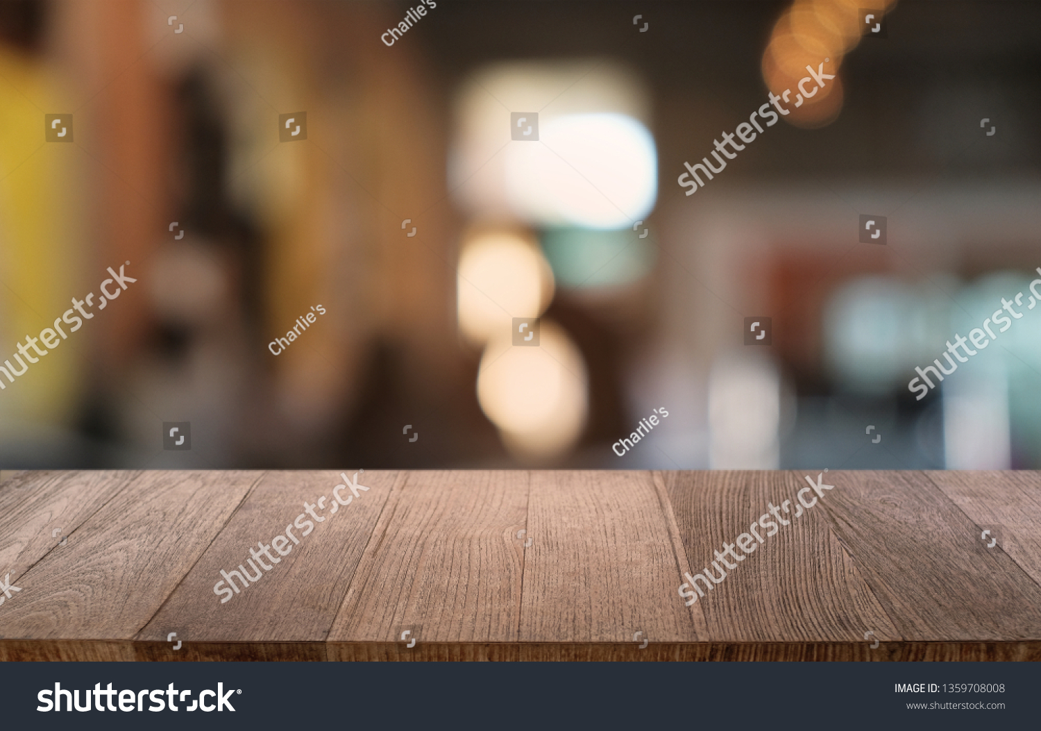 Empty dark wooden table in front of abstract blurred bokeh background of restaurant . can be used for display or montage your products.Mock up for space  #1359708008