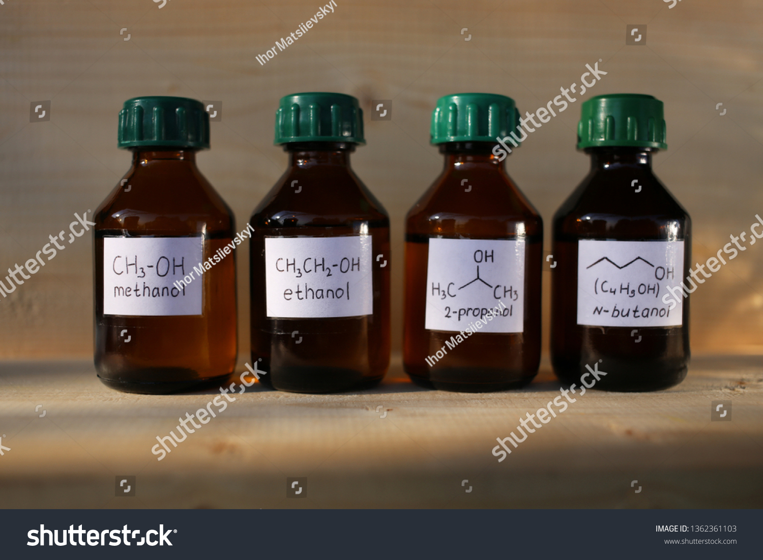 Polar protic solvents alcohols in dark glass bottles: methanol, ethanol, isopropanol, butanol. These substances are used as fuel additives to increase the octane number. #1362361103