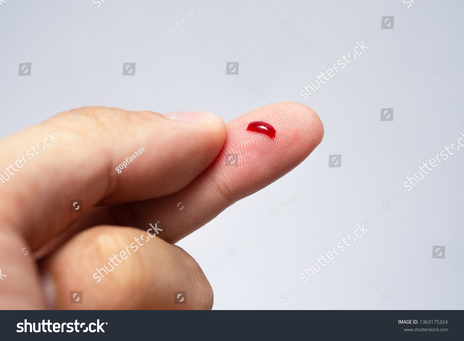 Bleeding blood from the cut finger wound. - Royalty Free Stock Photo ...