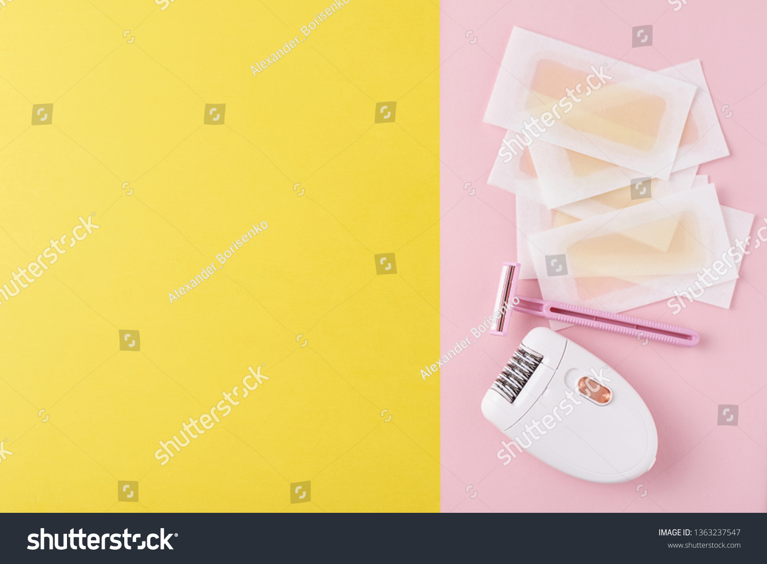 Epilator, razor for shaving and wax strips on yellow and pink background with copy space. Set for depilation, bodycare concept #1363237547