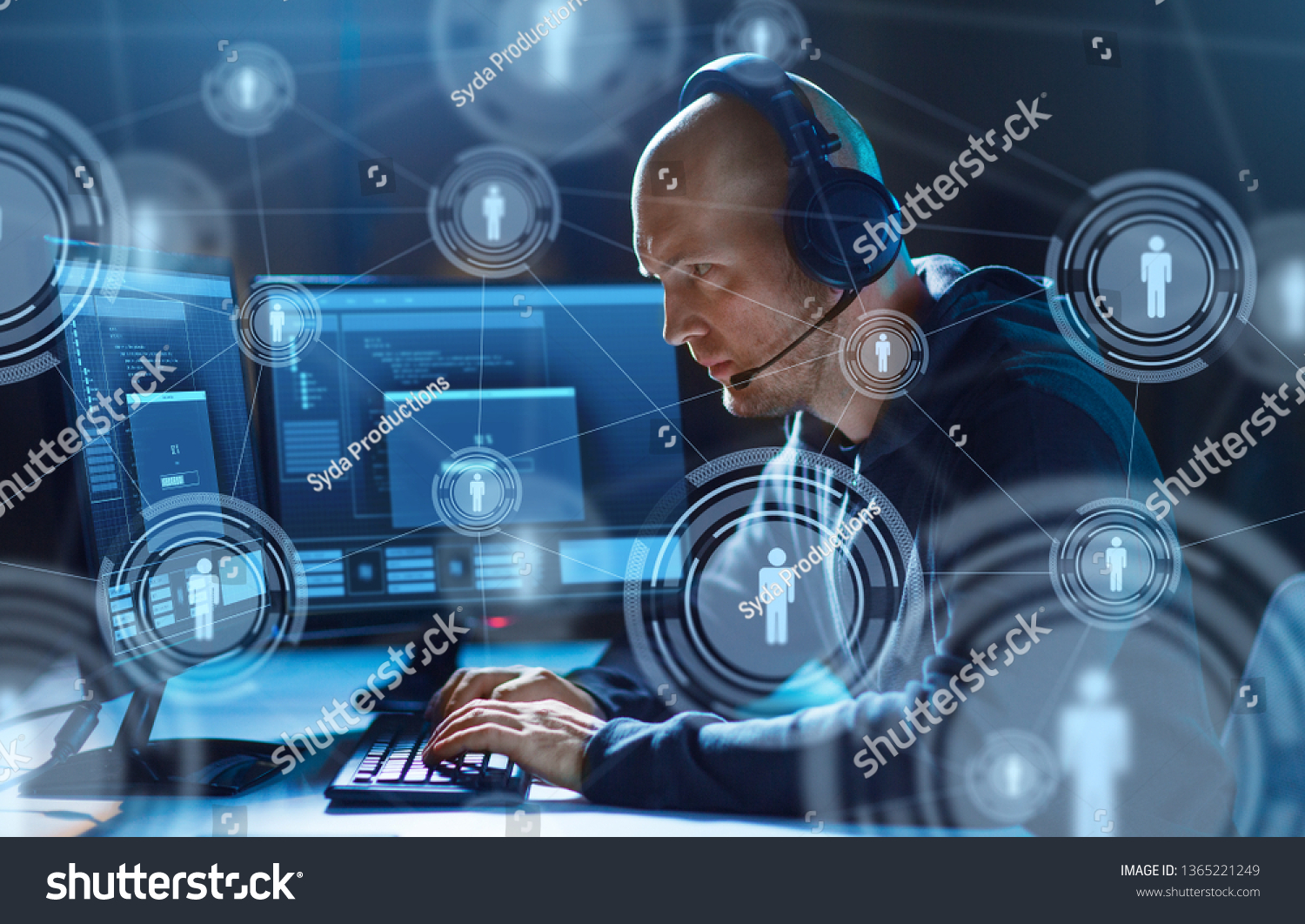 cybercrime, hacking and technology concept - male hacker in headset with progress loading bar on computer screen wiretapping or using virus program for cyber attack in dark room #1365221249
