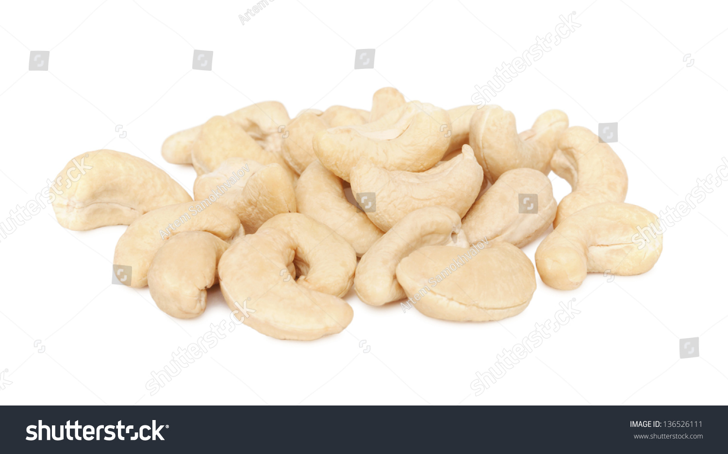 Pile of cashew nuts isolated on white background #136526111