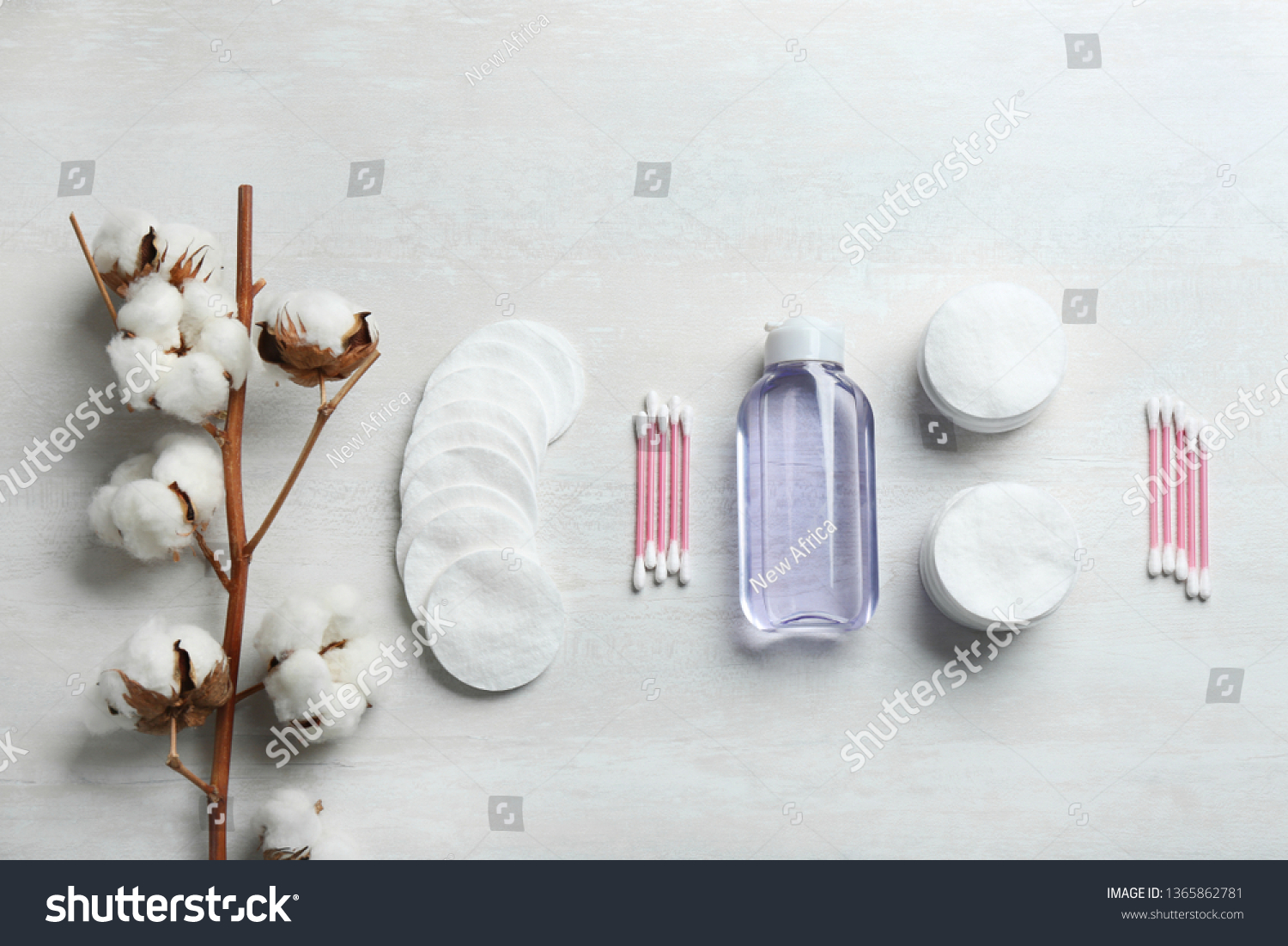 Flat lay composition with cotton hygienic products on light background #1365862781